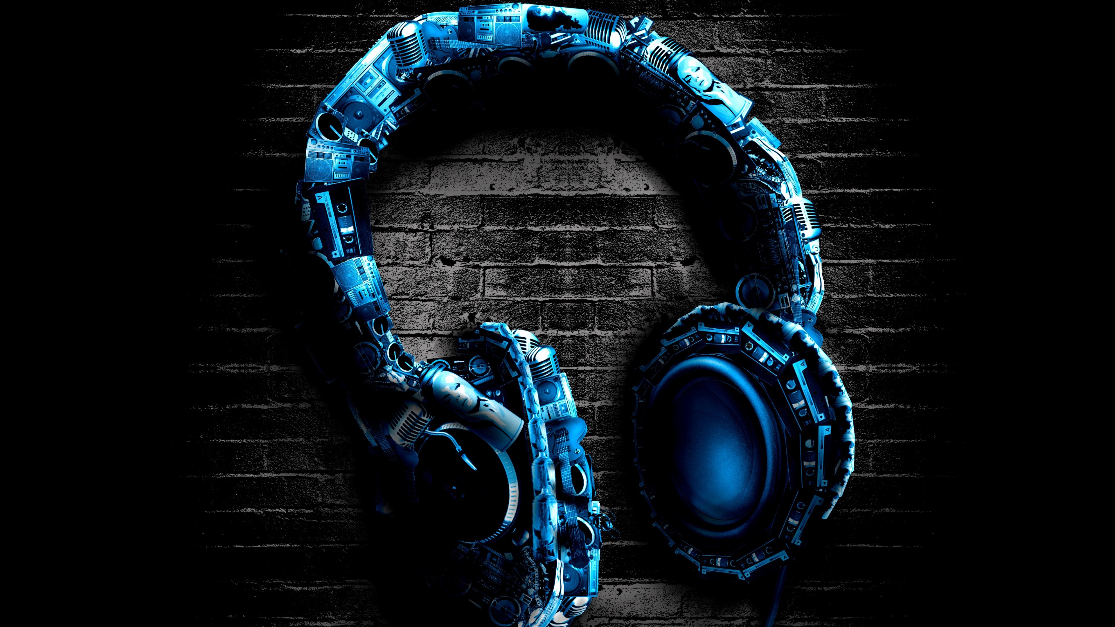 Drawing of headphones on a black brick wall