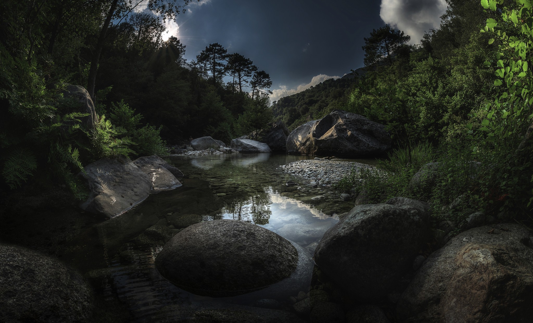 Free photo A big puddle among the rocks