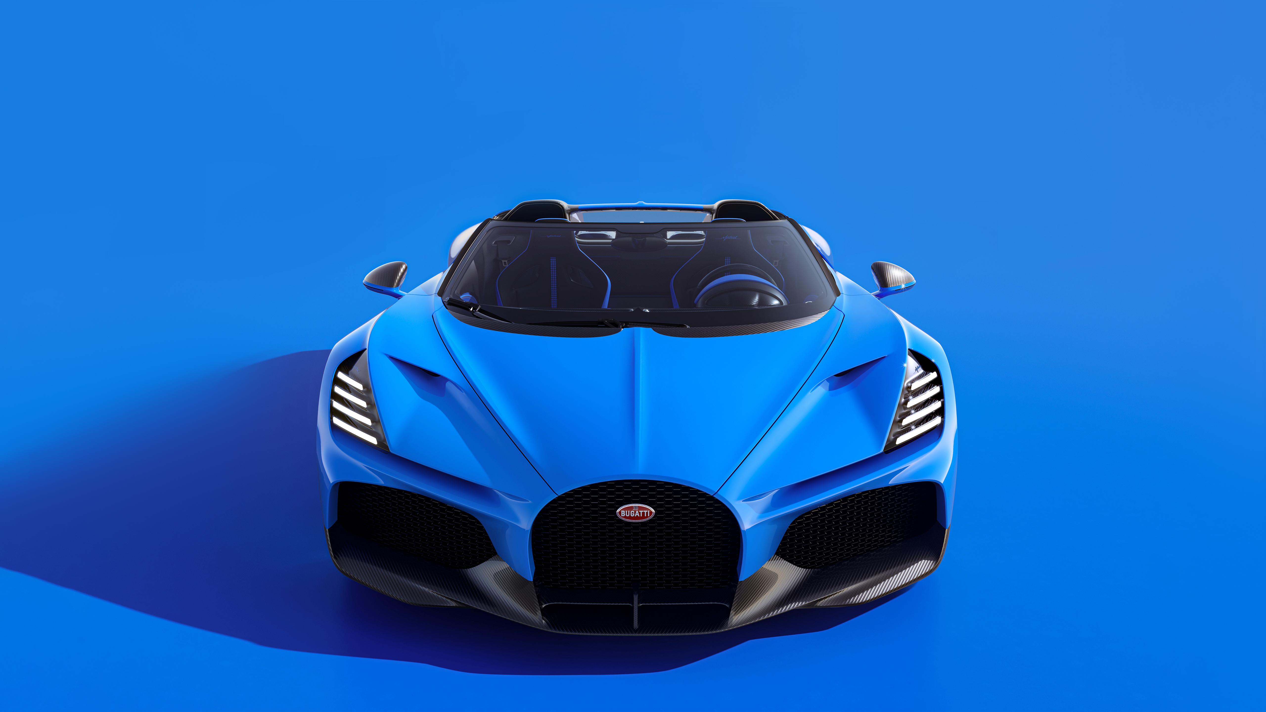 Free photo Blue Bugatti W16 Mistral 2024 on a blue background