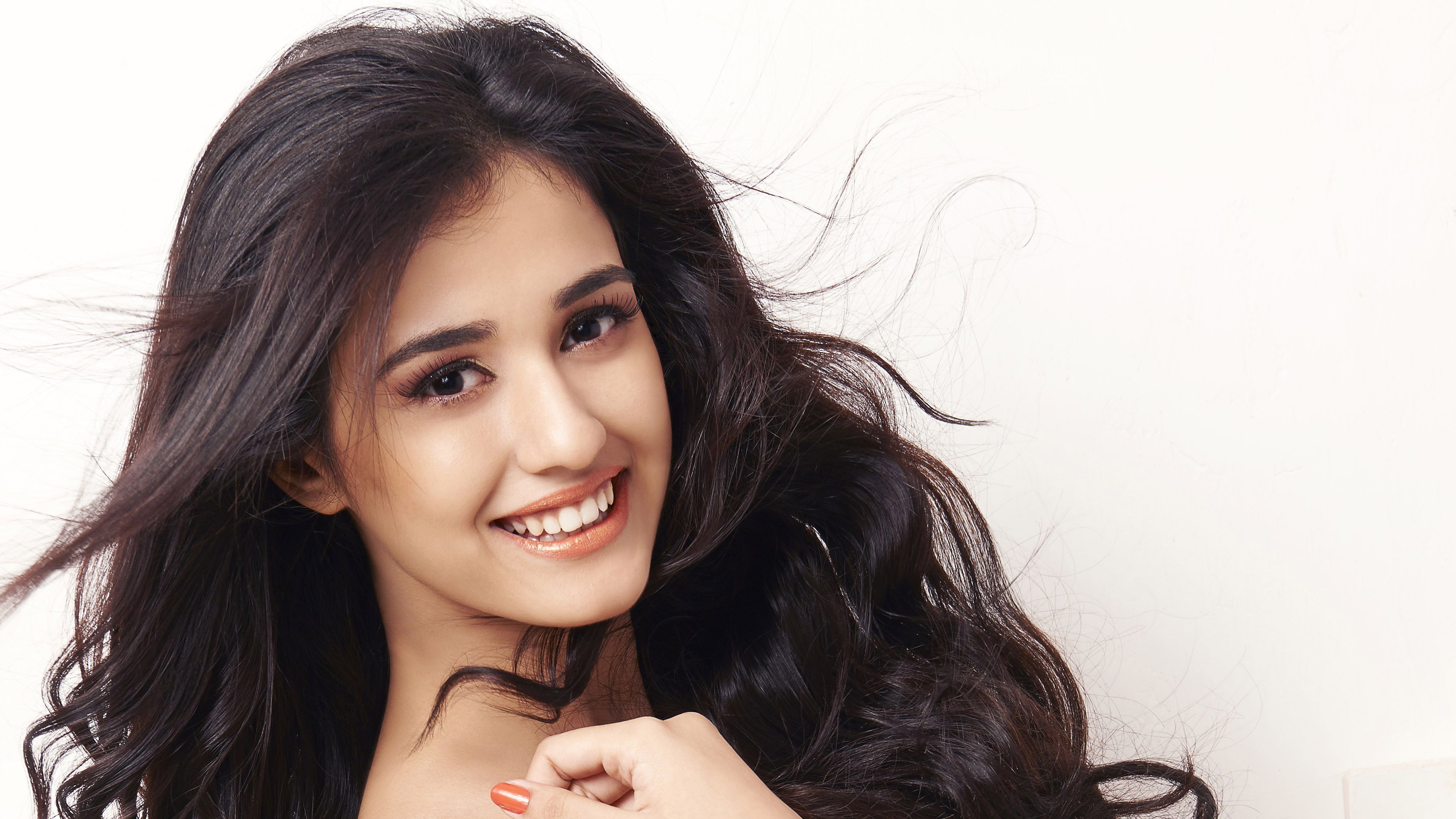 Free photo Indian actress Disha Patani smiles for the camera