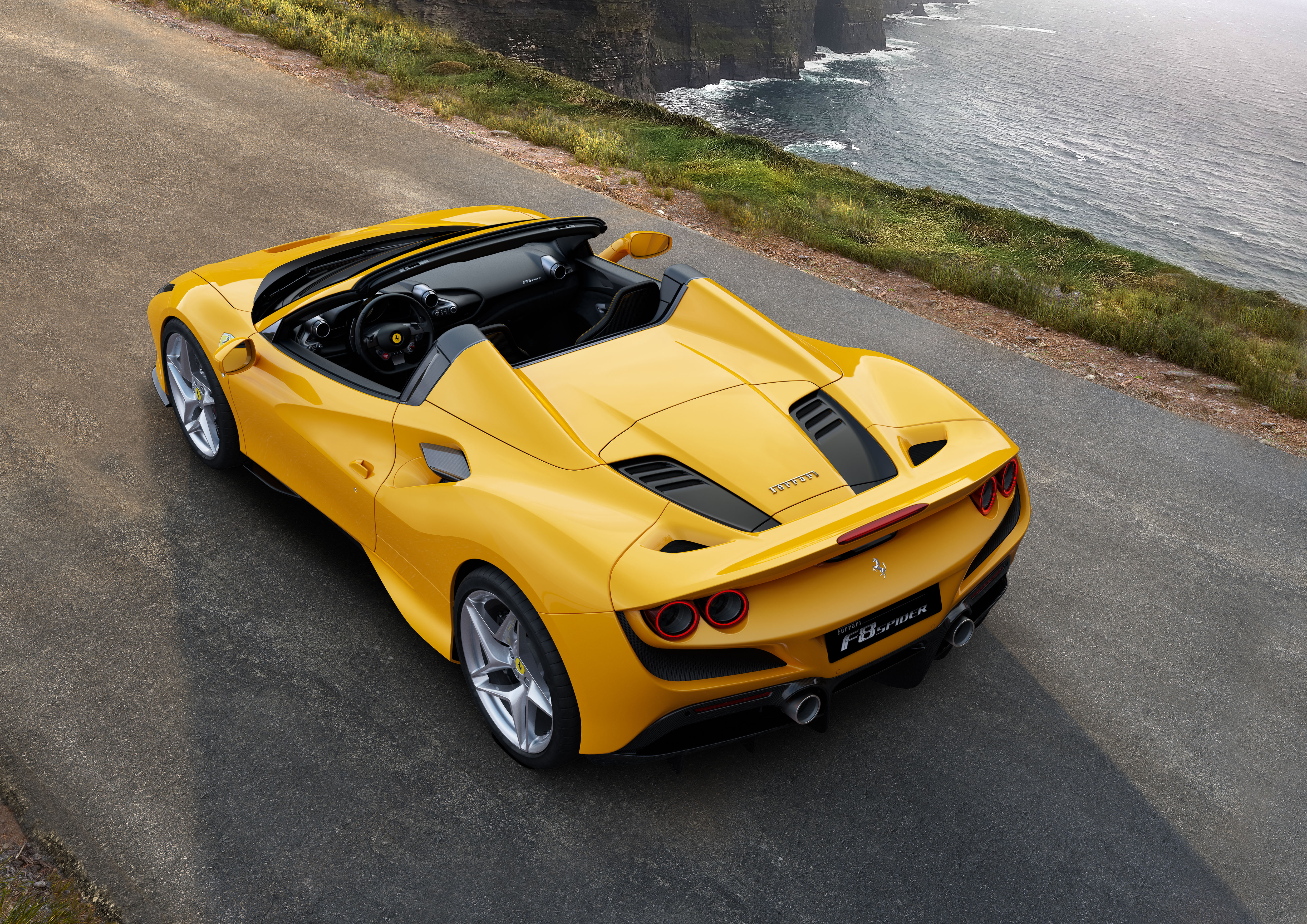 Yellow ferrari f8 spider.