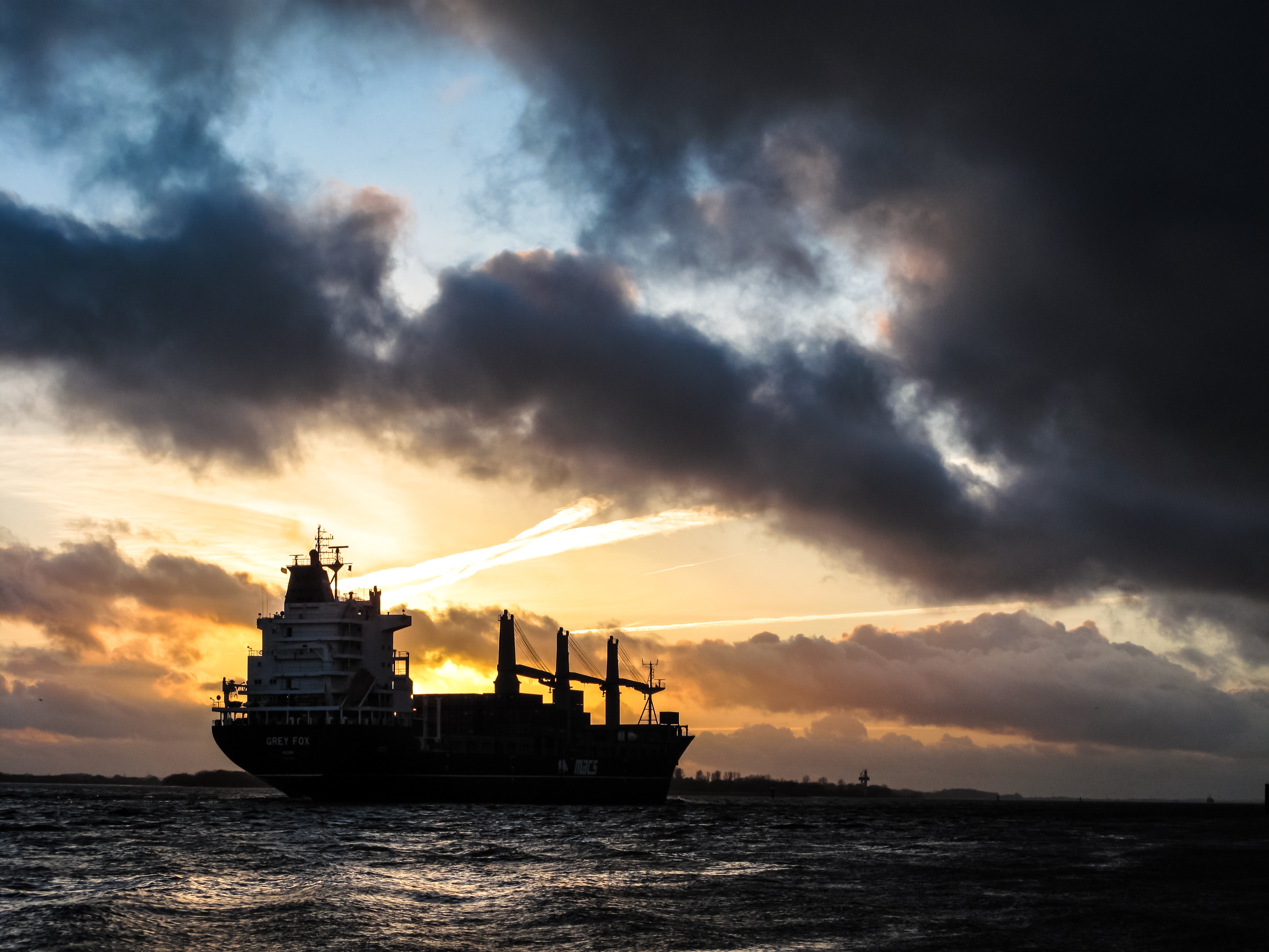 Free photo A ship against the evening sky