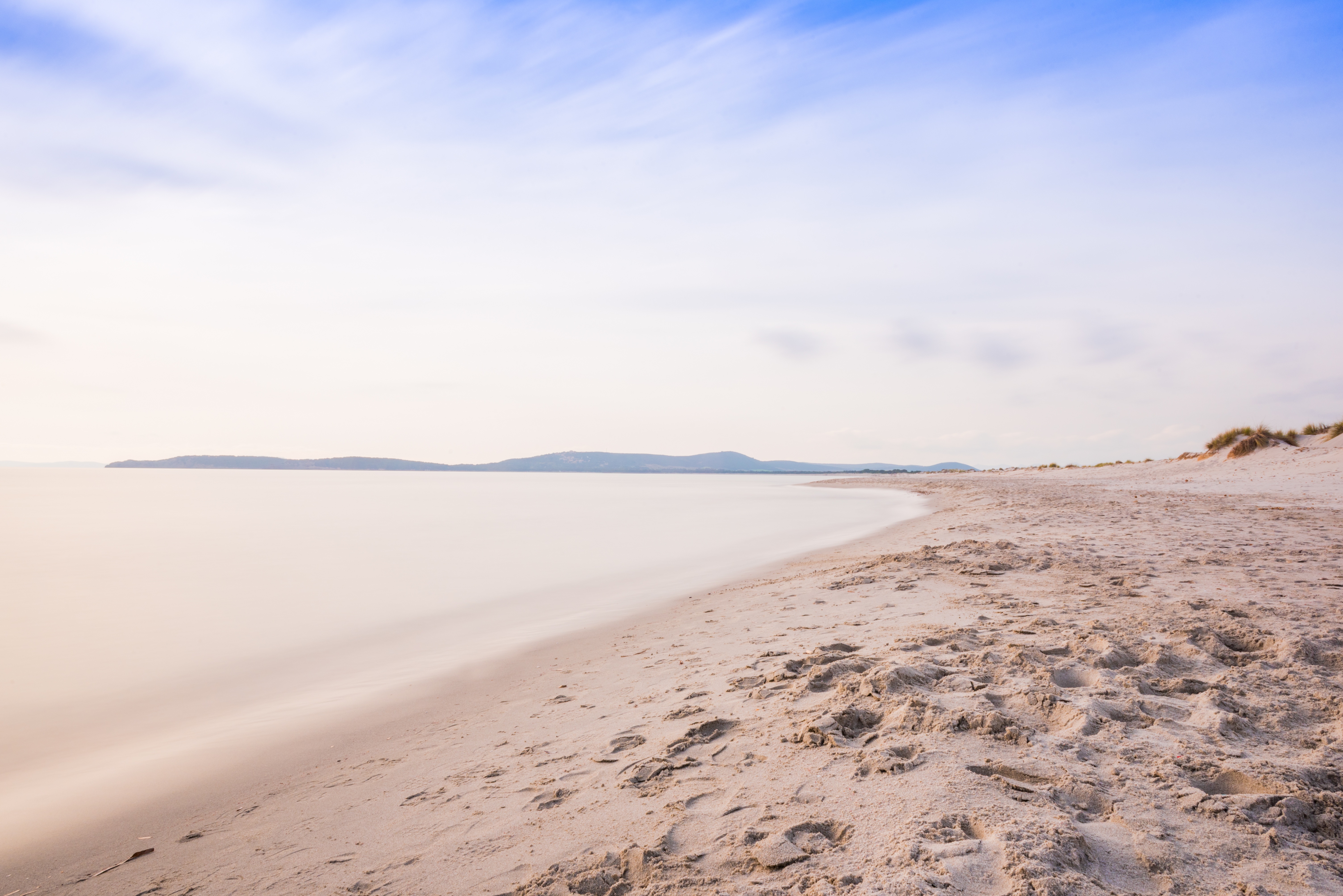 Morning on the sandy beach of the sea