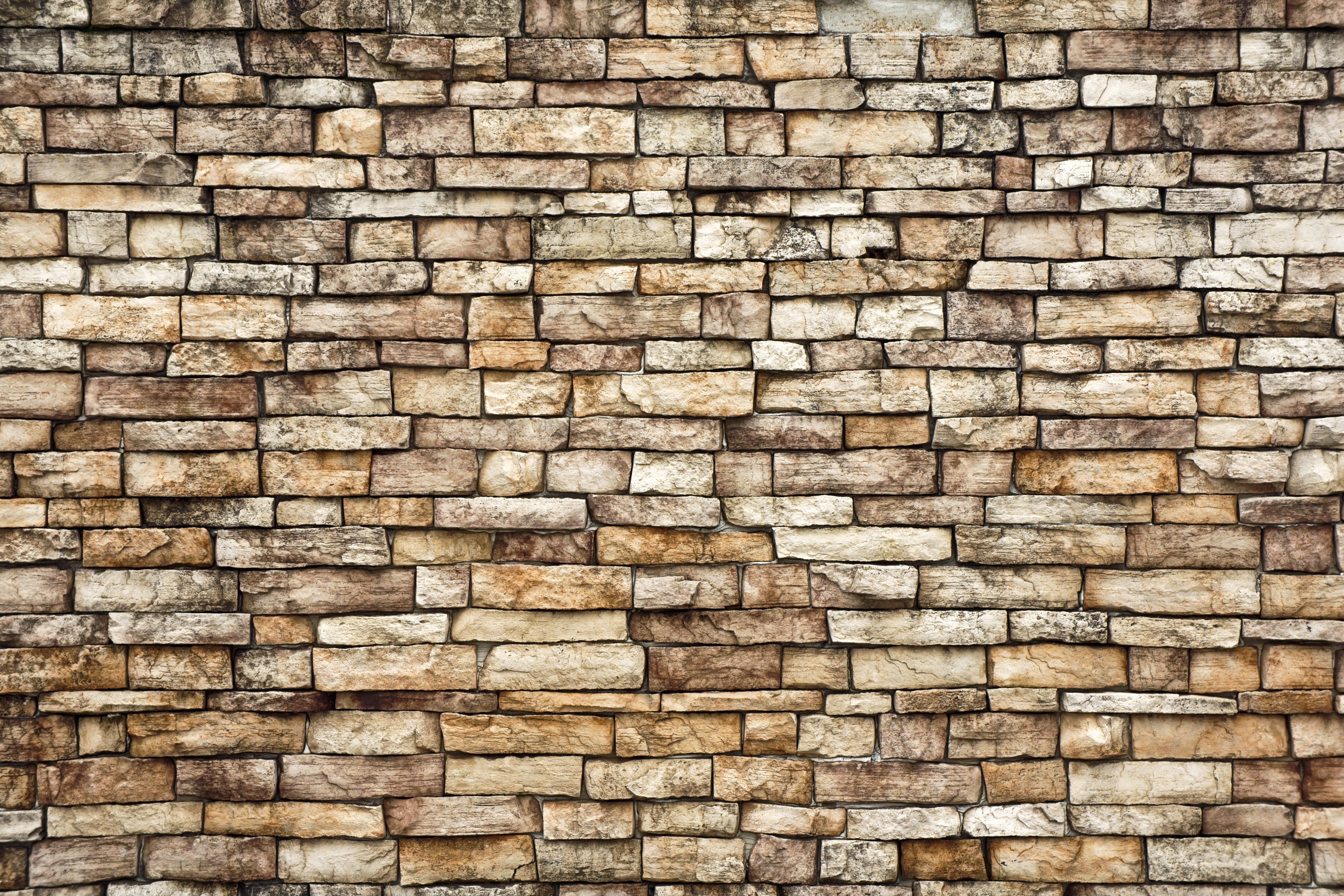 Free photo A wall of different stones