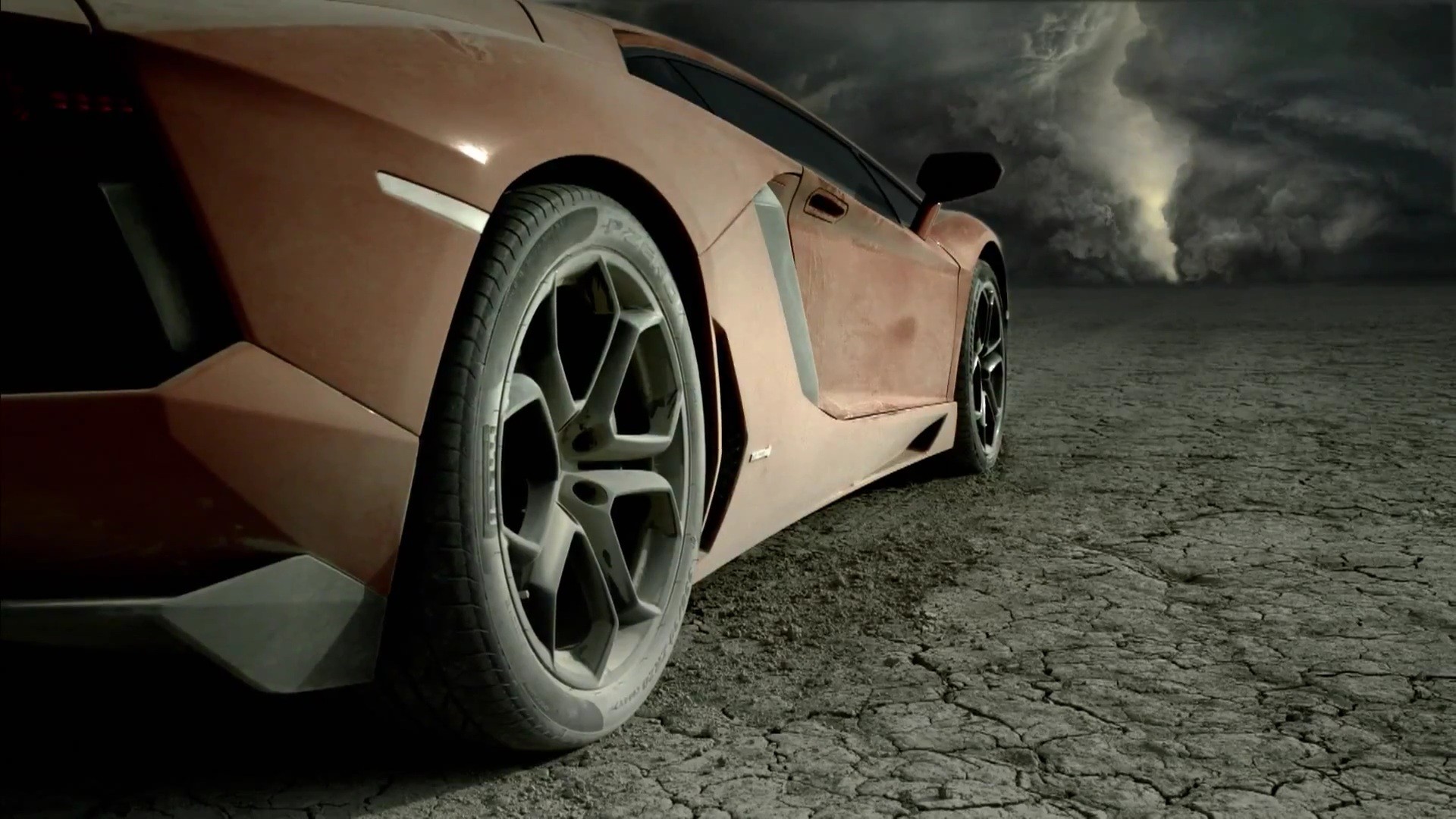 A desktop picture of a dusty Lamborghini.