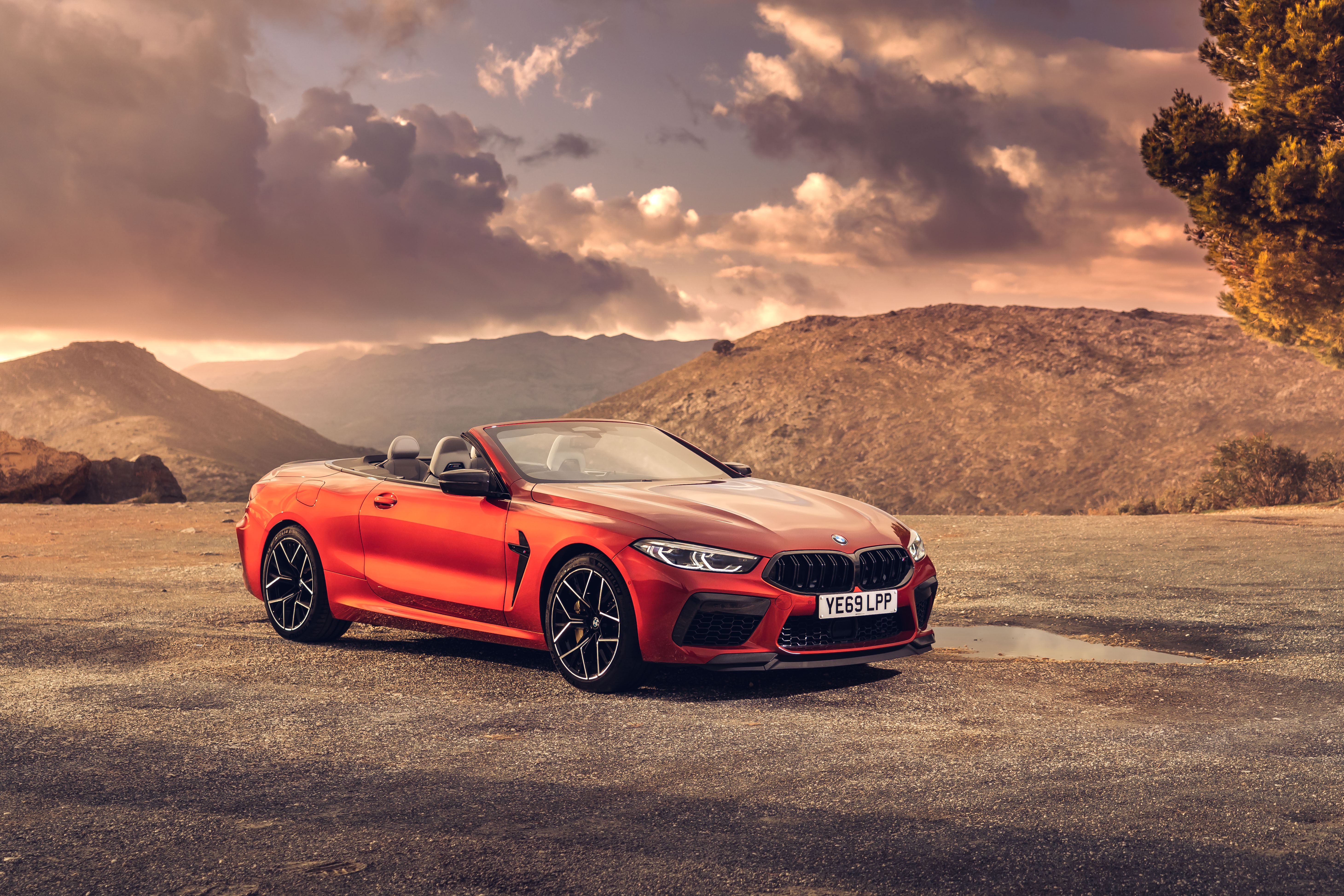 Free photo BMW M8 convertible in orange.