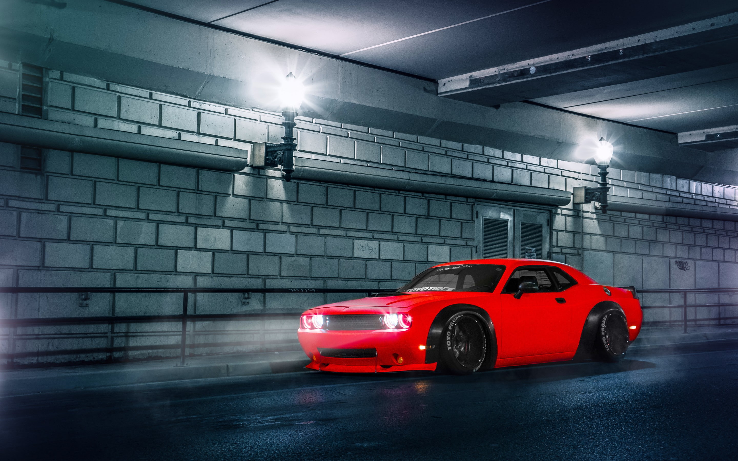 Free photo Wallpaper with a red dodge challenger srt in the tunnel