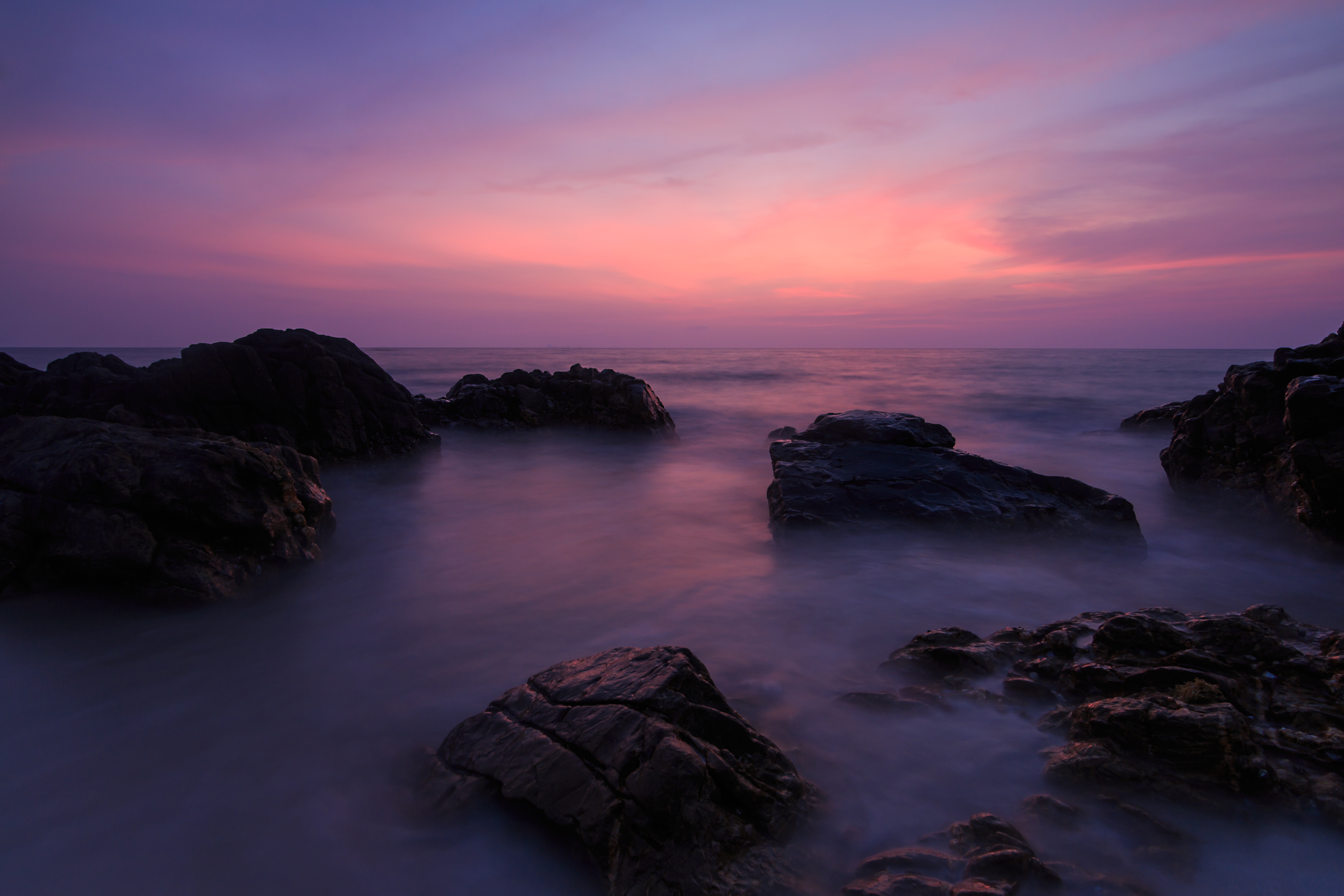 免费照片海边的粉色夕阳
