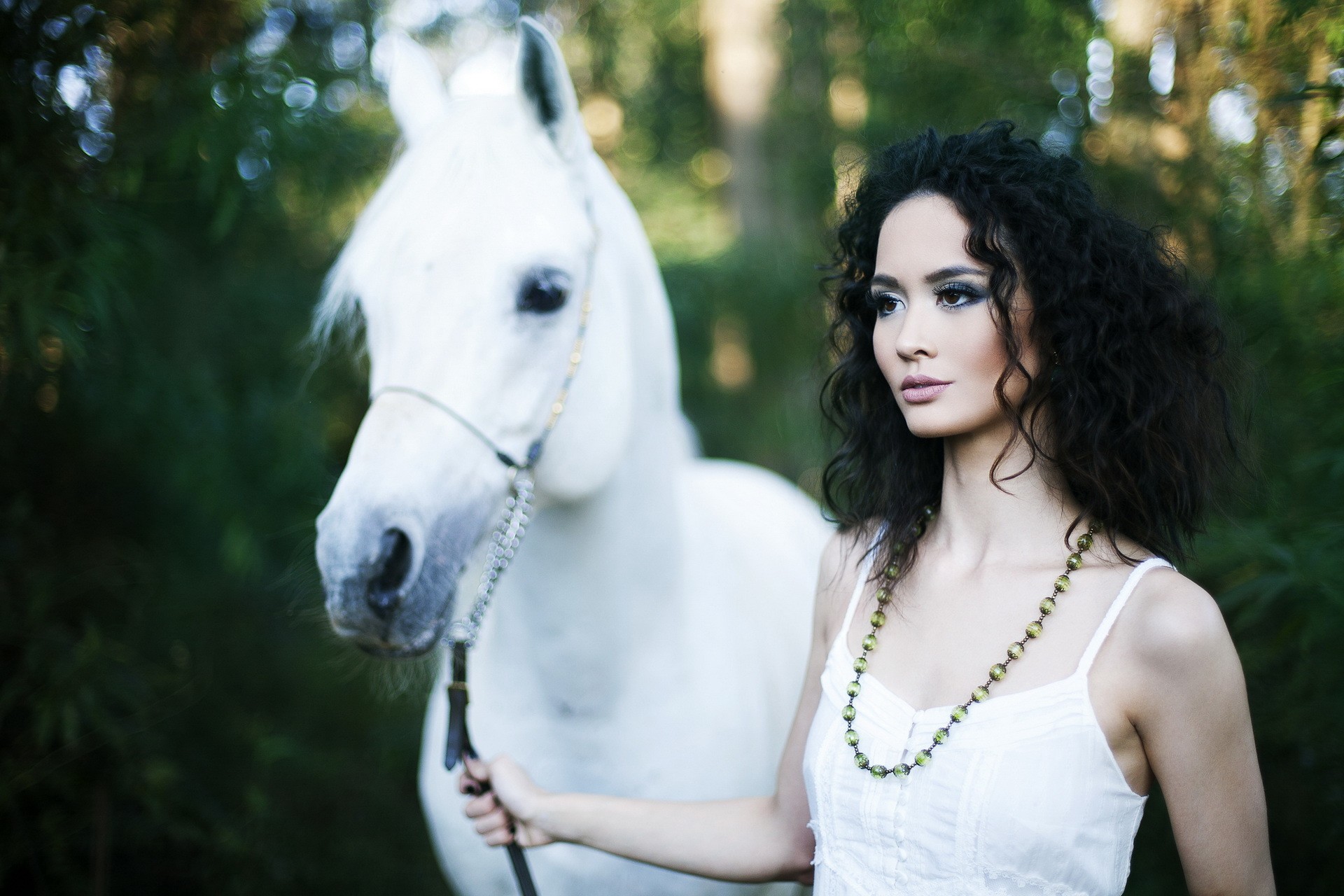The white horse and the woman