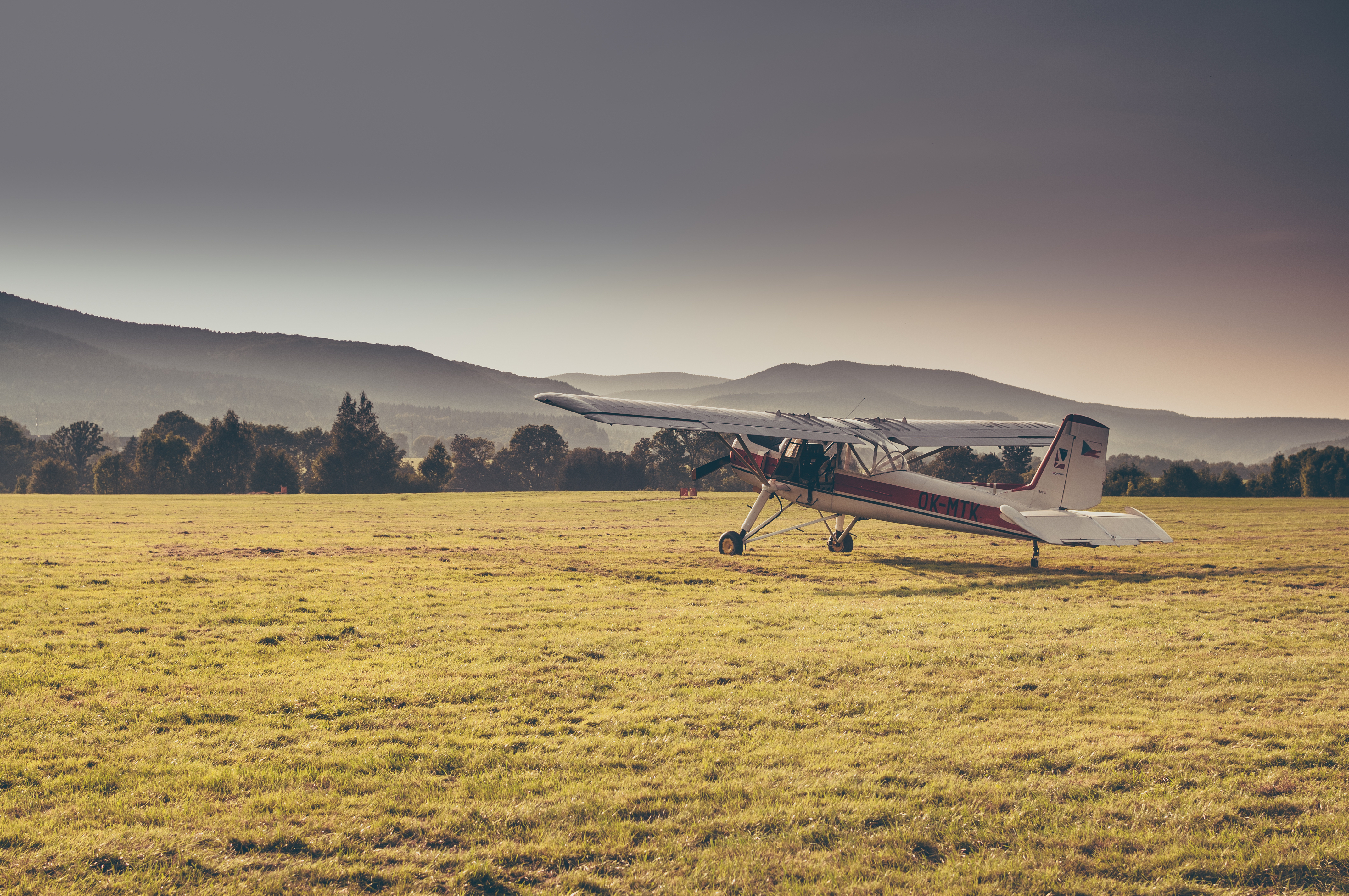 Private plane in the field preparing for takeoff