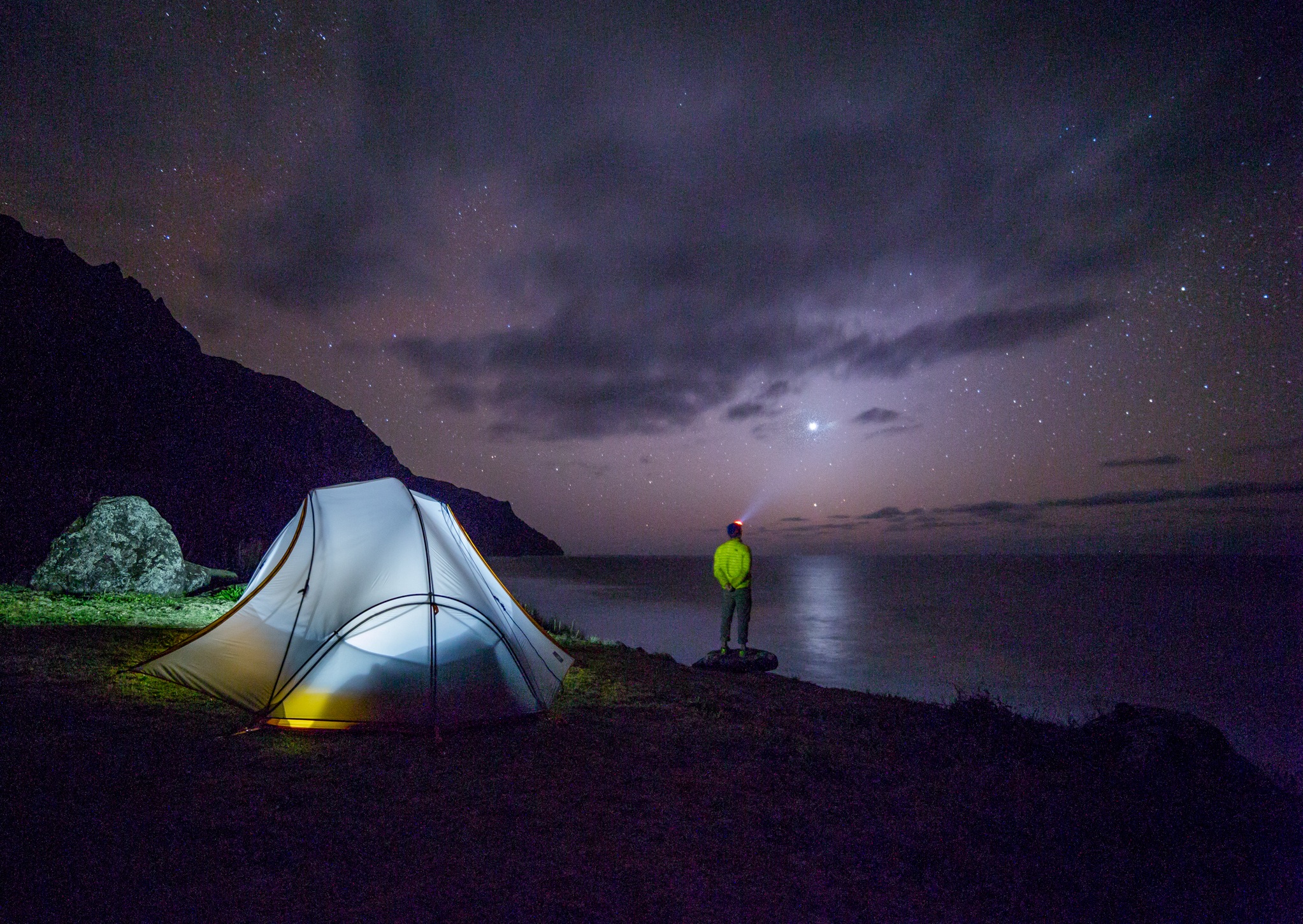 A tent on the beach in the darkness