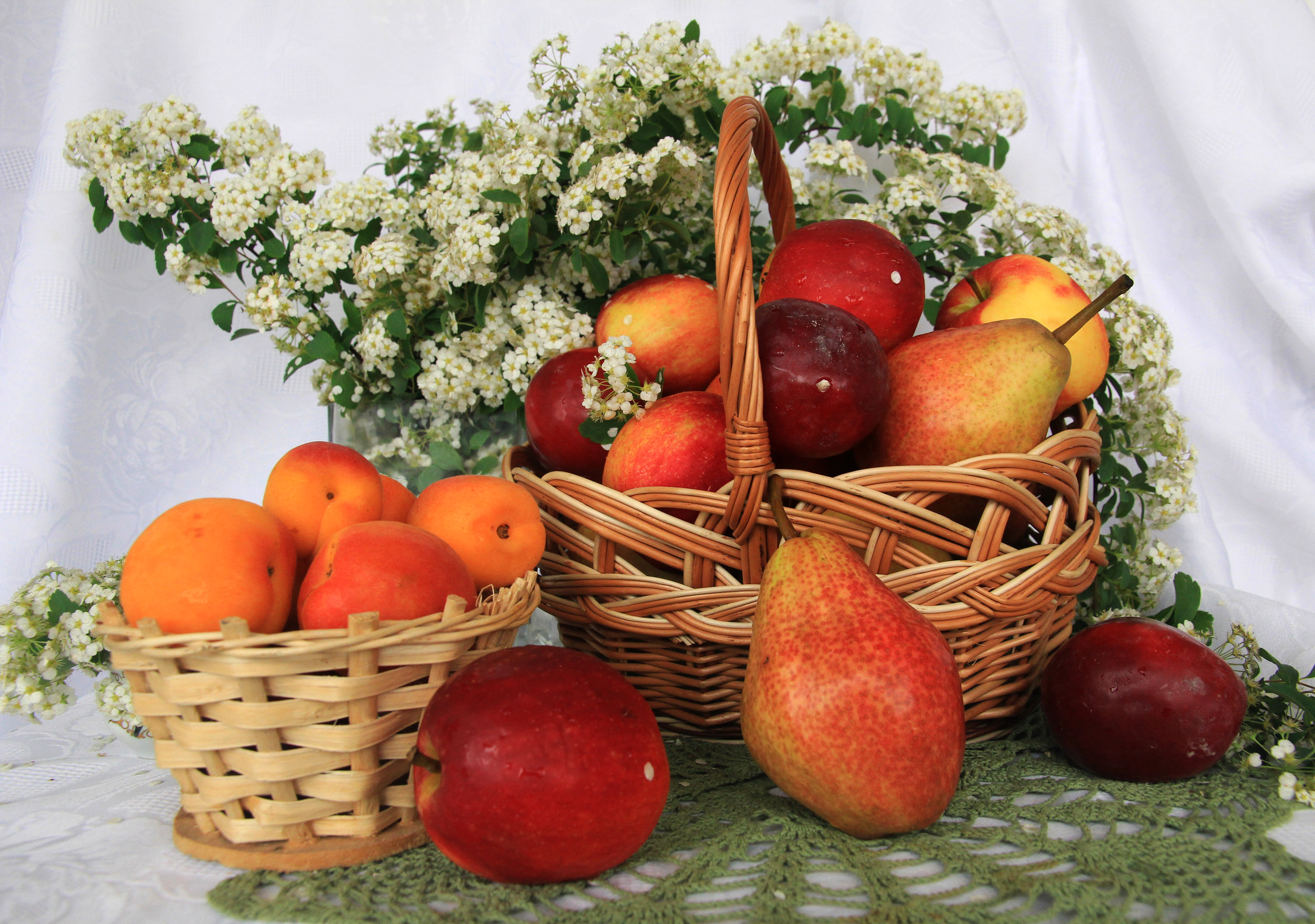 Free photo Lots of fruit and a bouquet