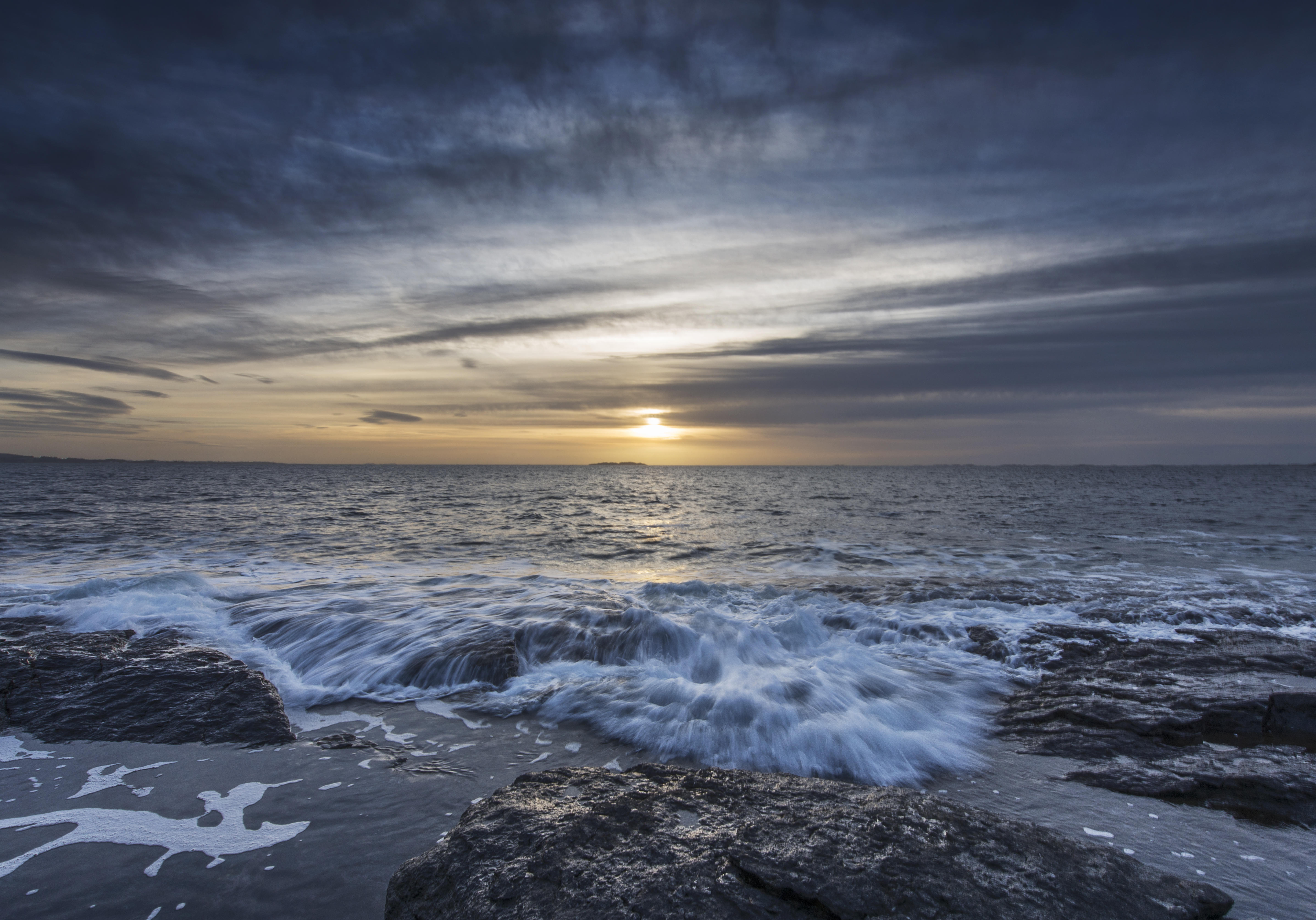 Free photo Rocks in the sand to the sea in Norway