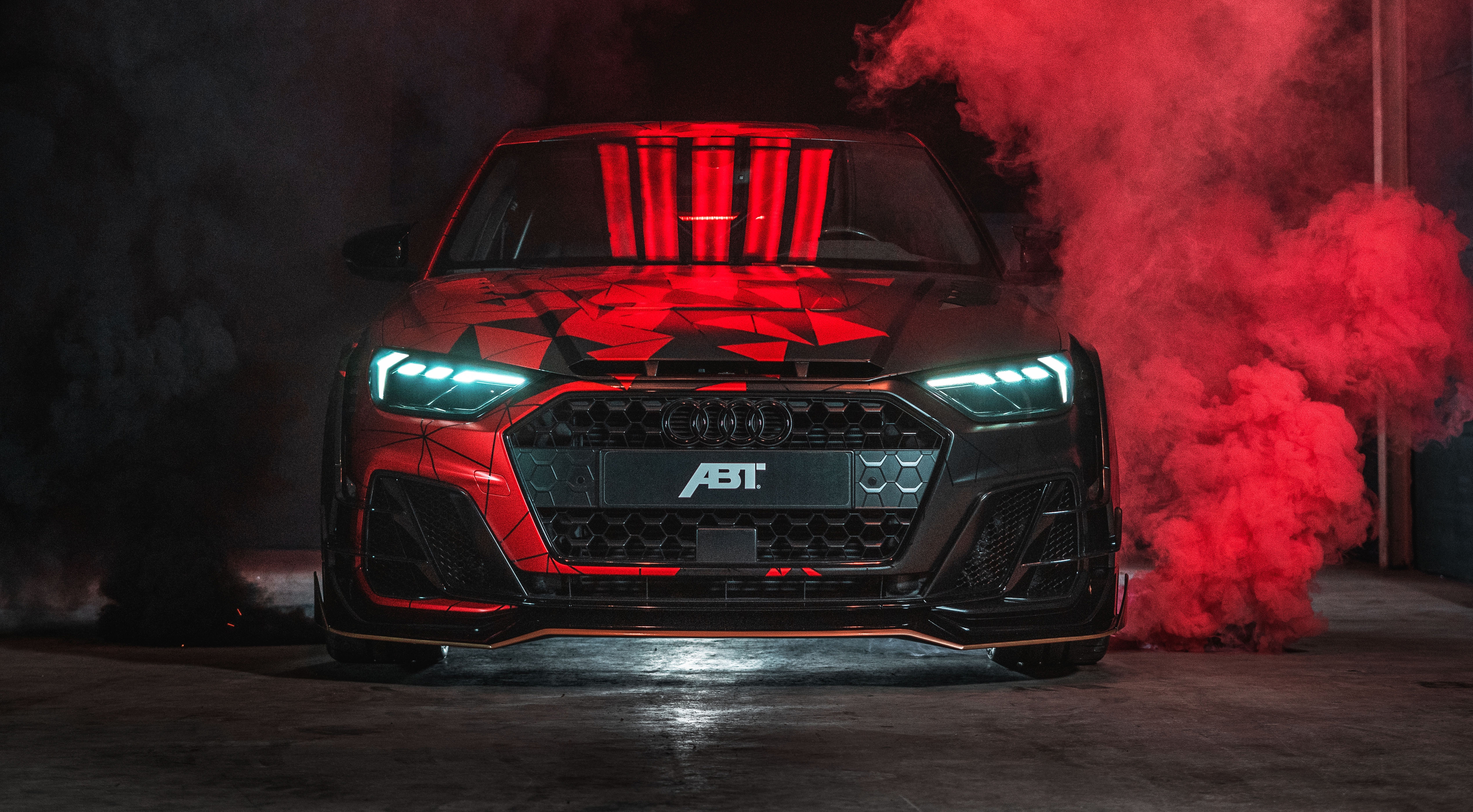 Free photo Wallpaper Audi A1 Abt Sportsline in red smoke