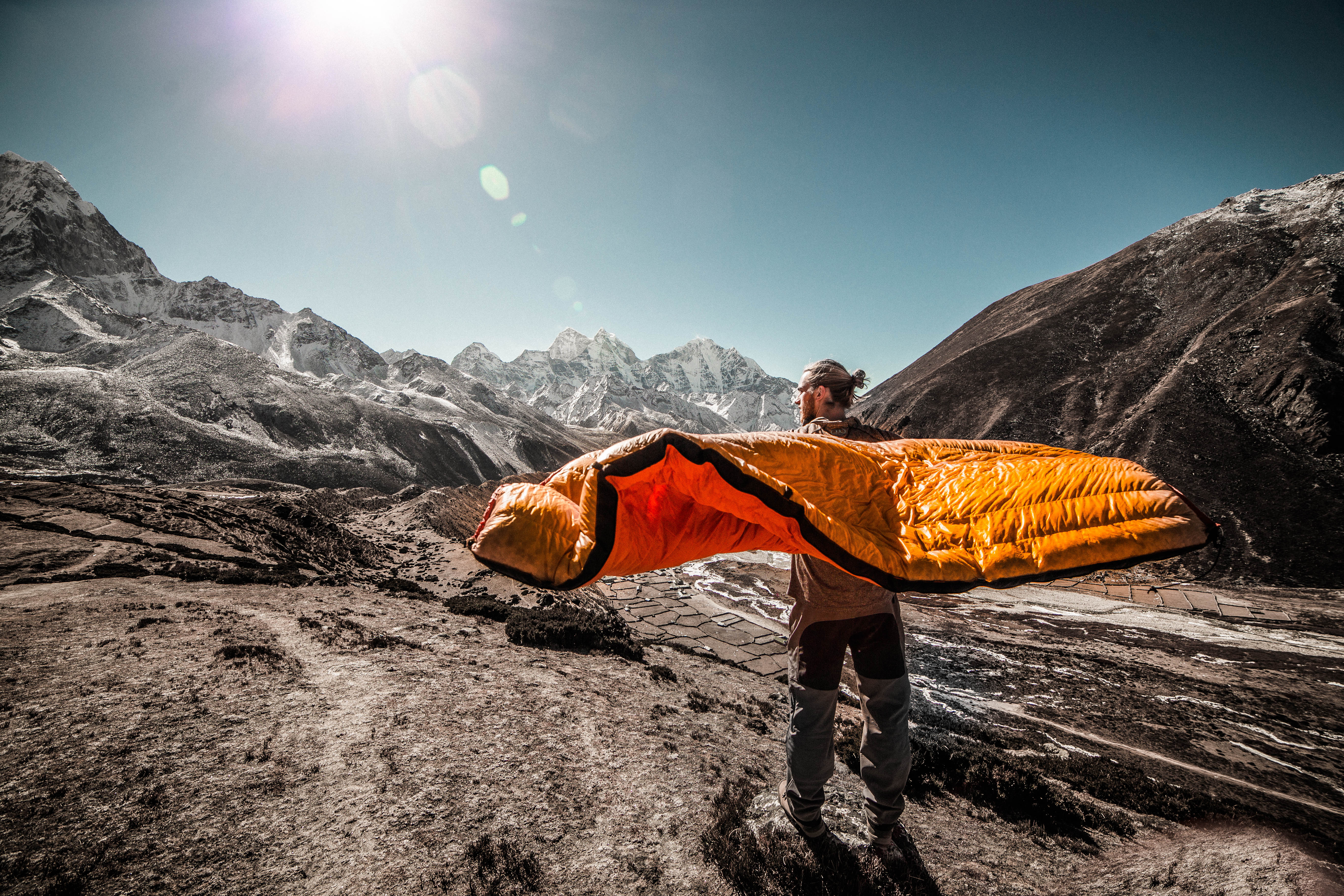 Free photo Vacationing in the mountains with a sleeping bag