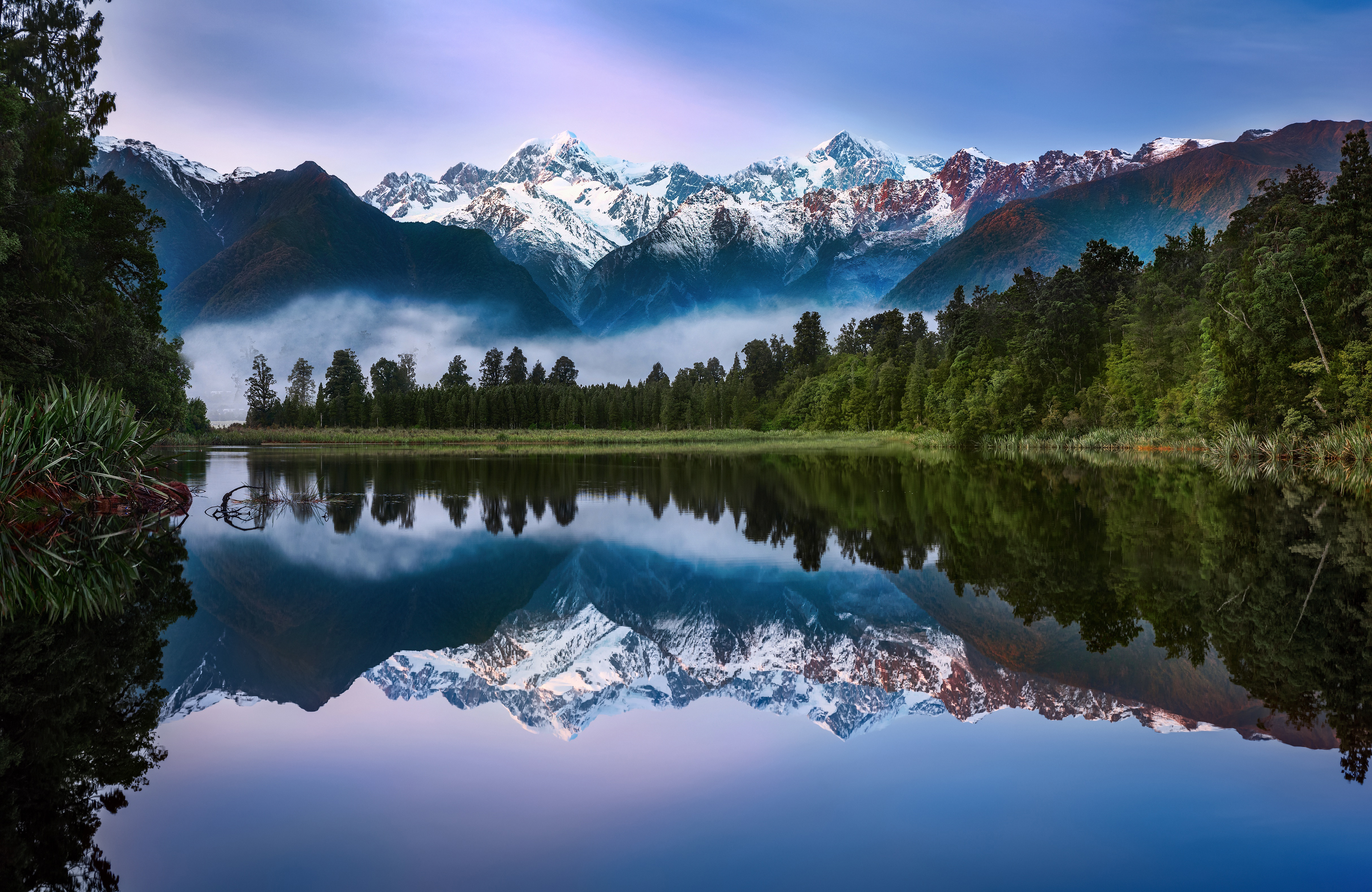 Free photo Mountains reflected in mirror lake