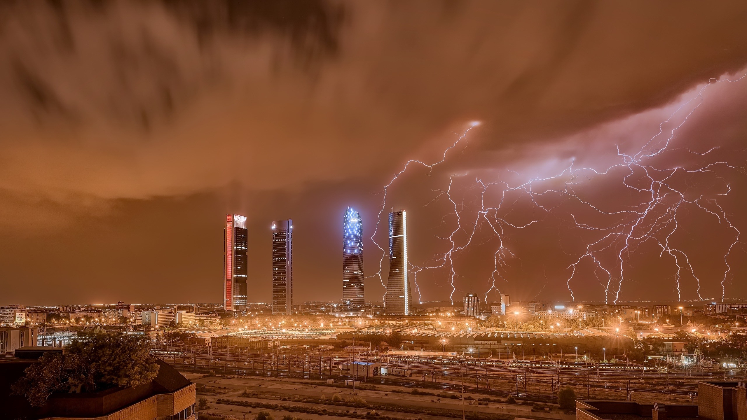 Wallpapers lightning Madrid skyscrapers on the desktop