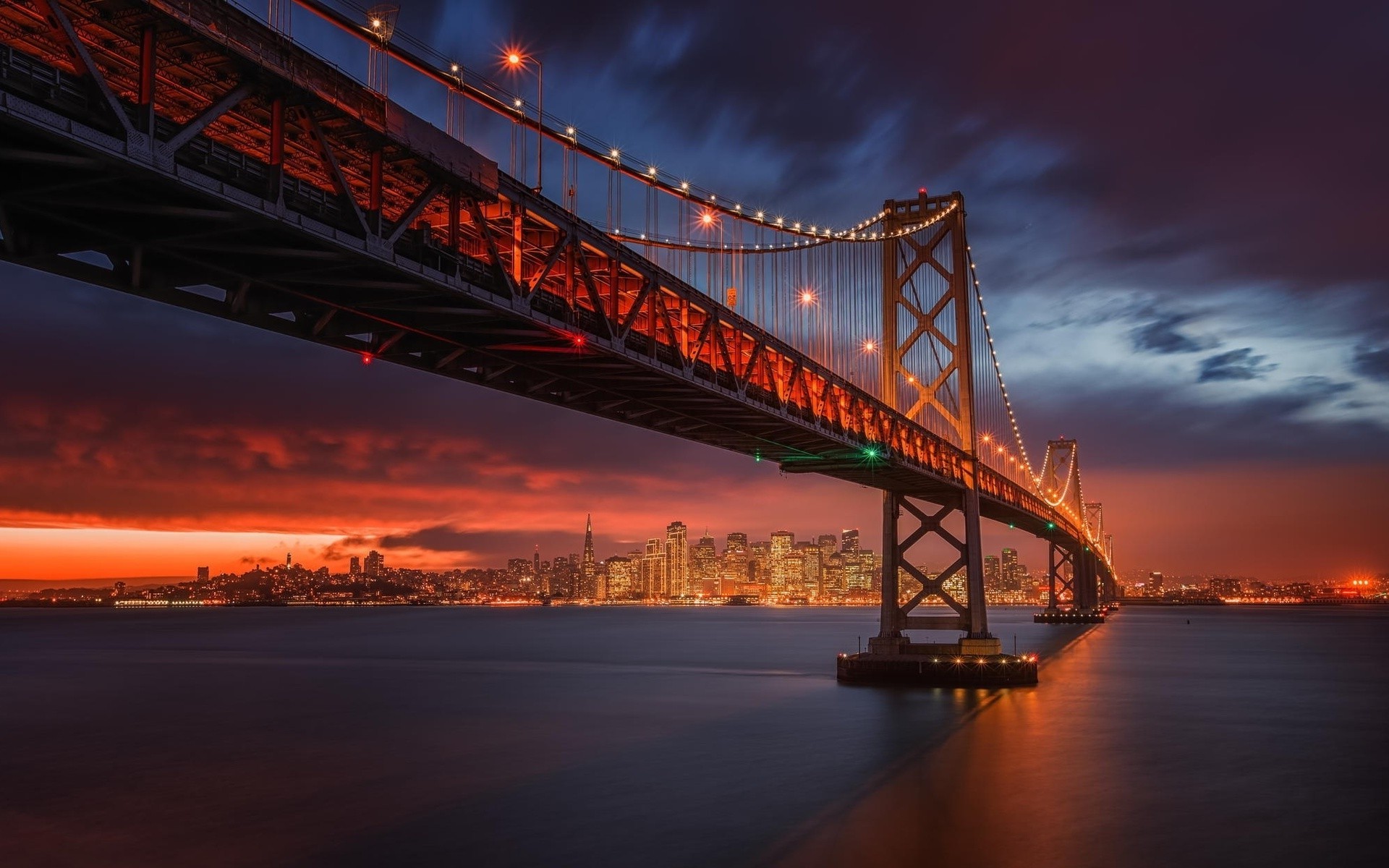 Free photo A glowing bridge over the water