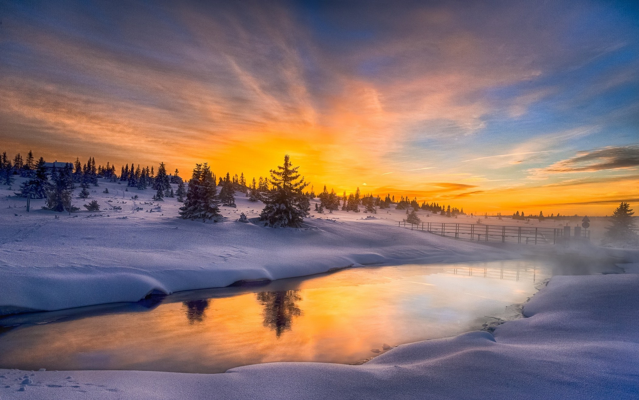 Winter landscape at sunset