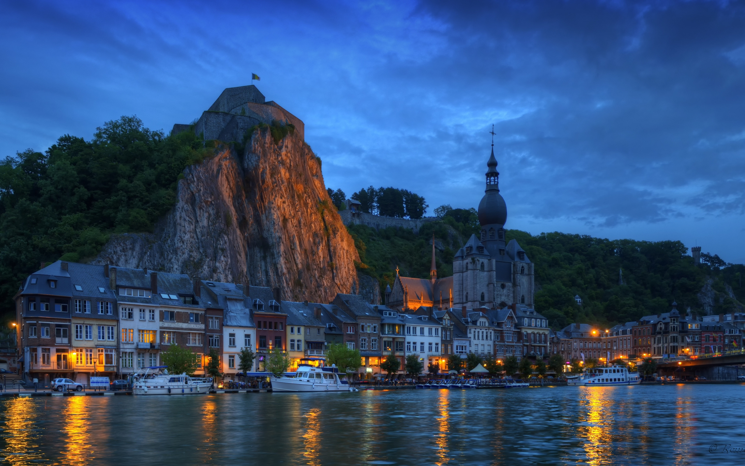 Houses by the water at night