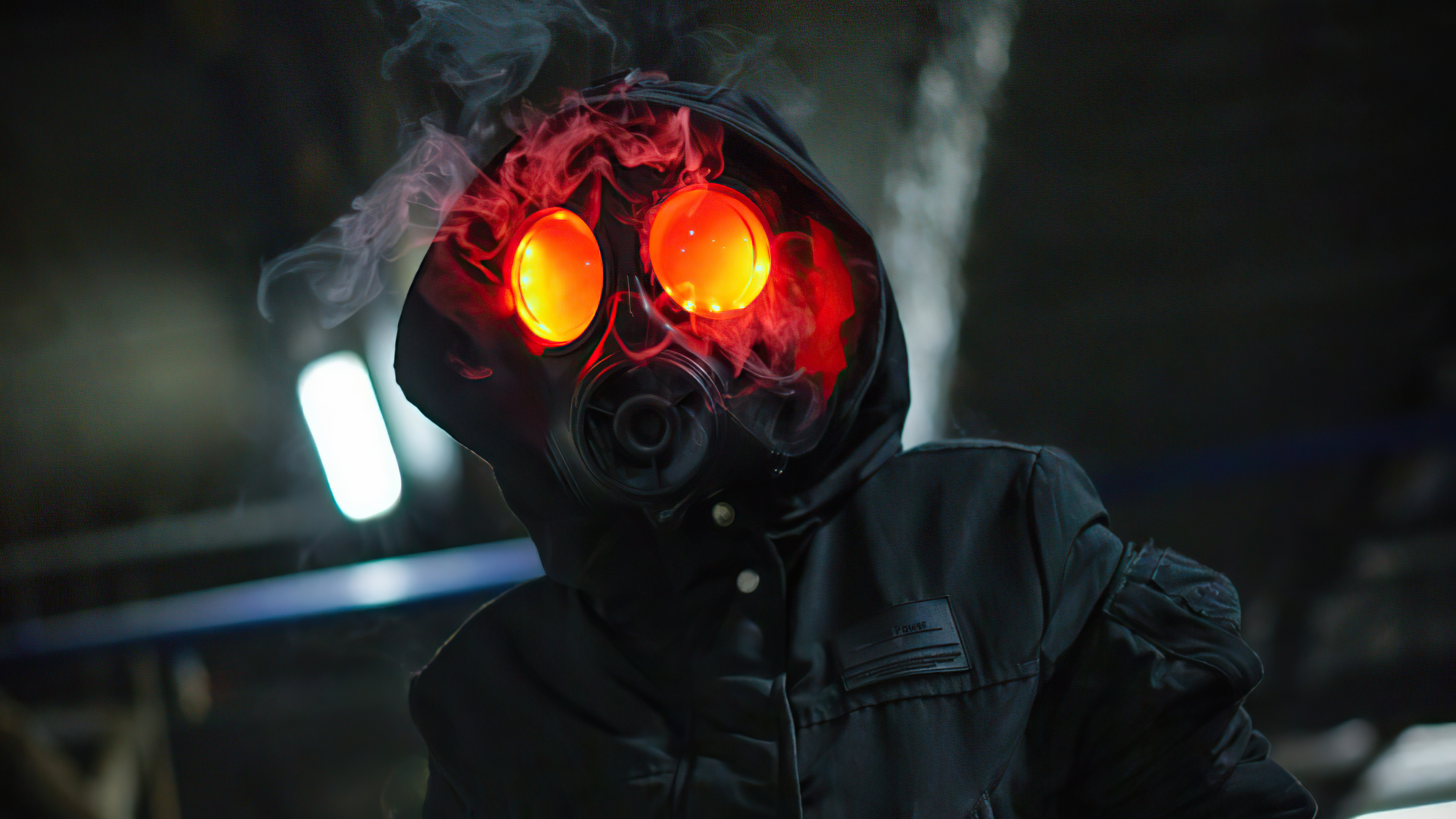 免费照片一个戴着防毒面具、眼睛冒红烟的男人