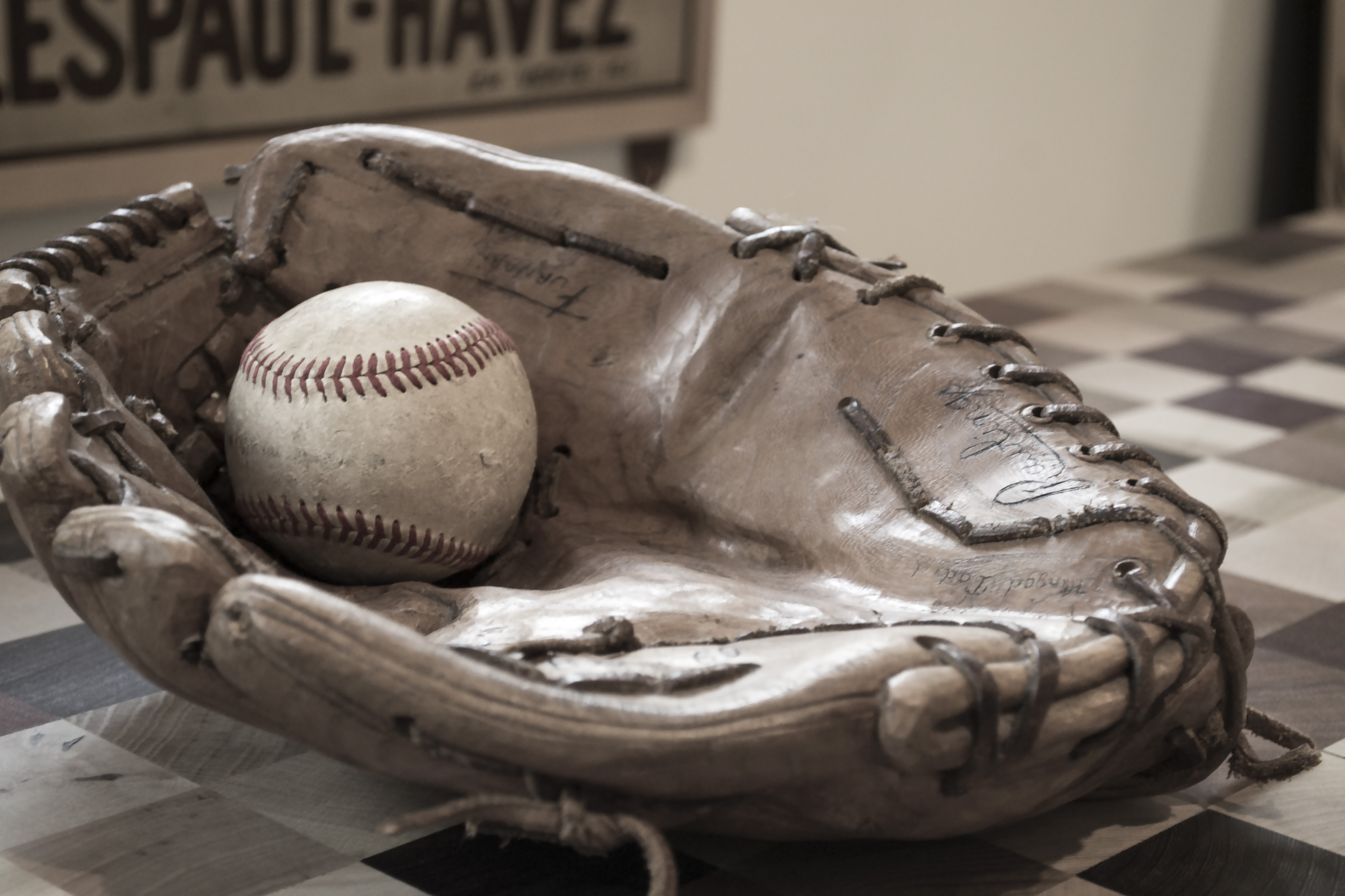 Free photo Baseball glove with ball.