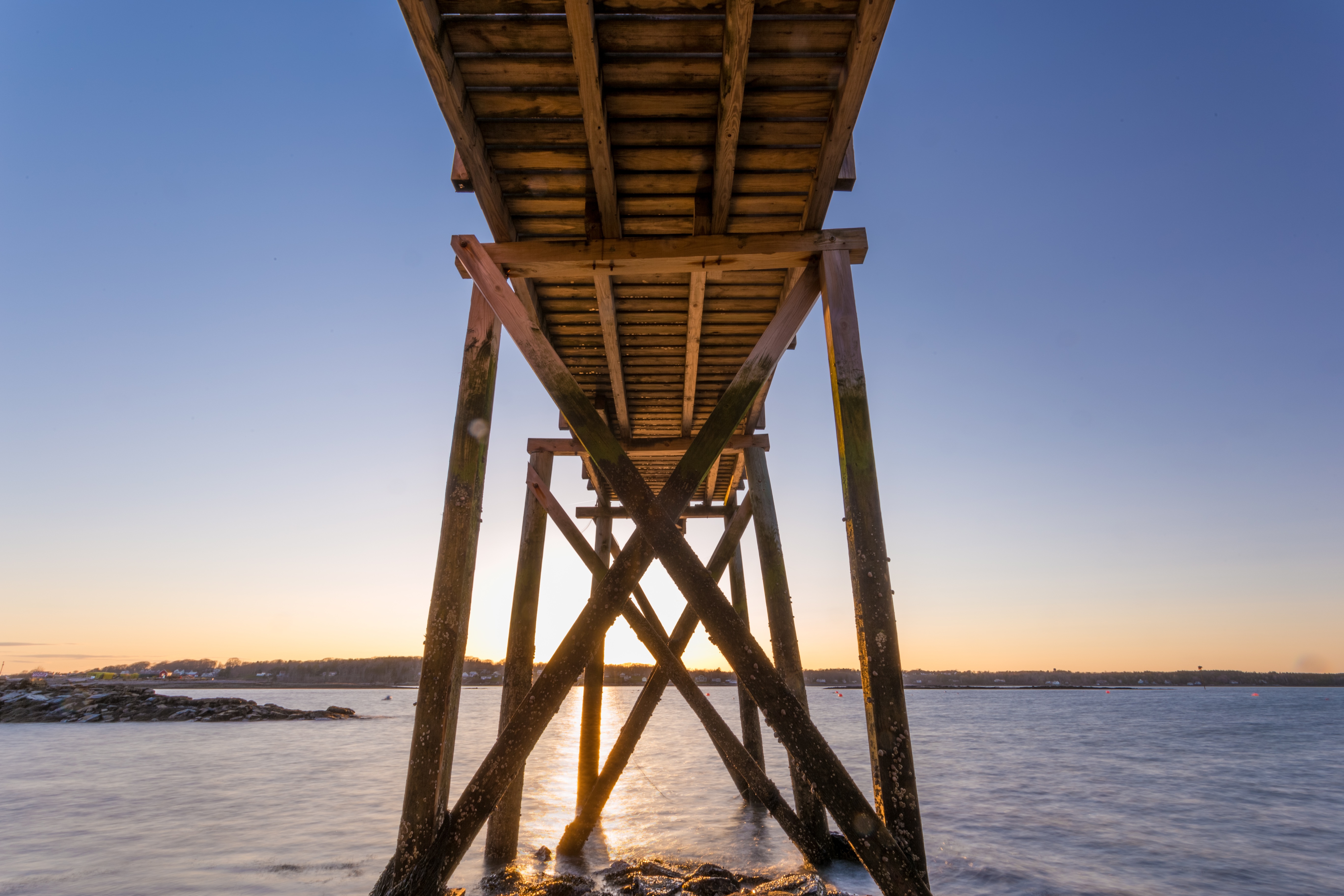 Free photo A wooden bridge over the water