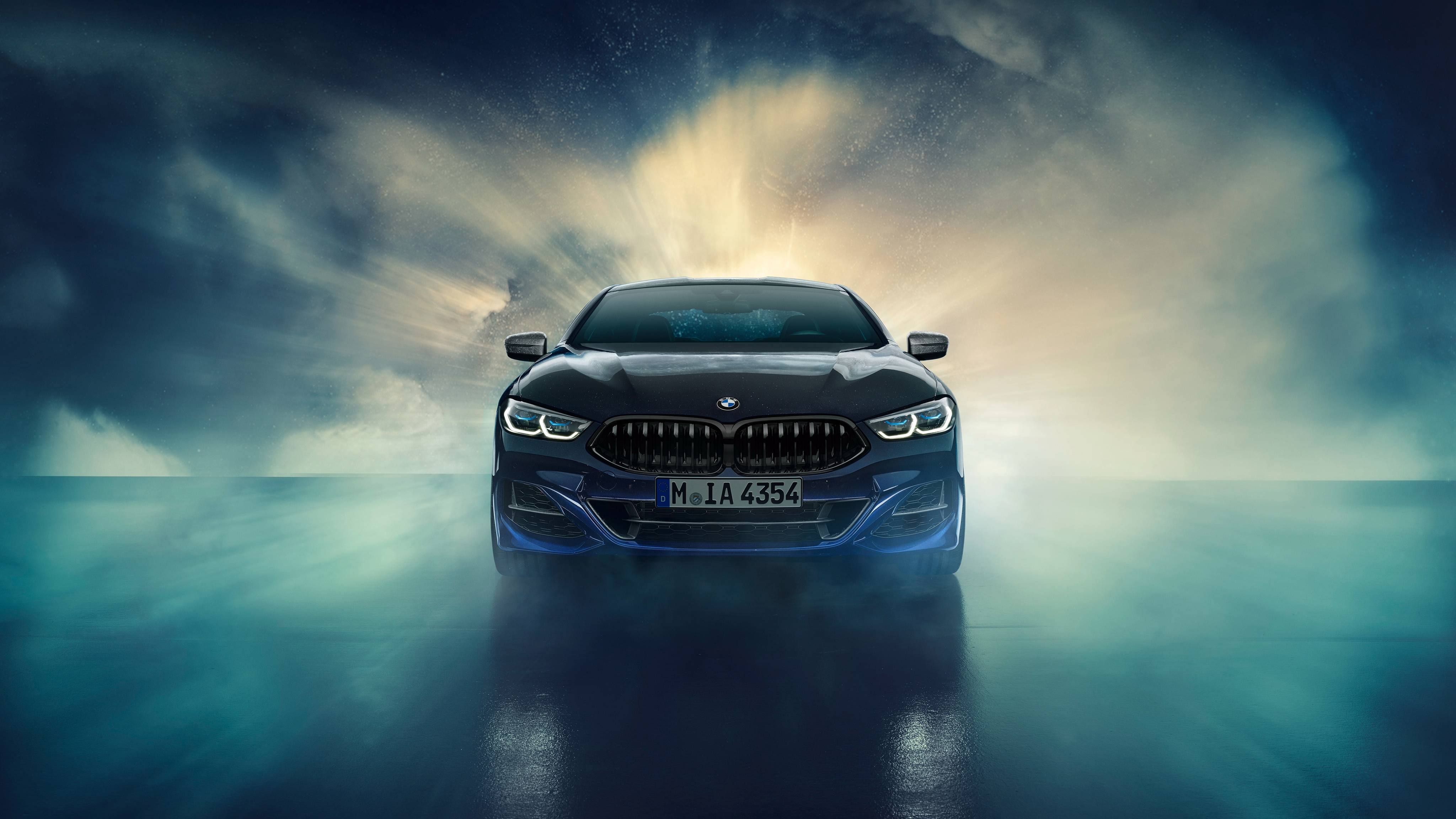 Free photo Bmw Individual M850i Xdrive Coupe Night Sky against a backdrop of smoke