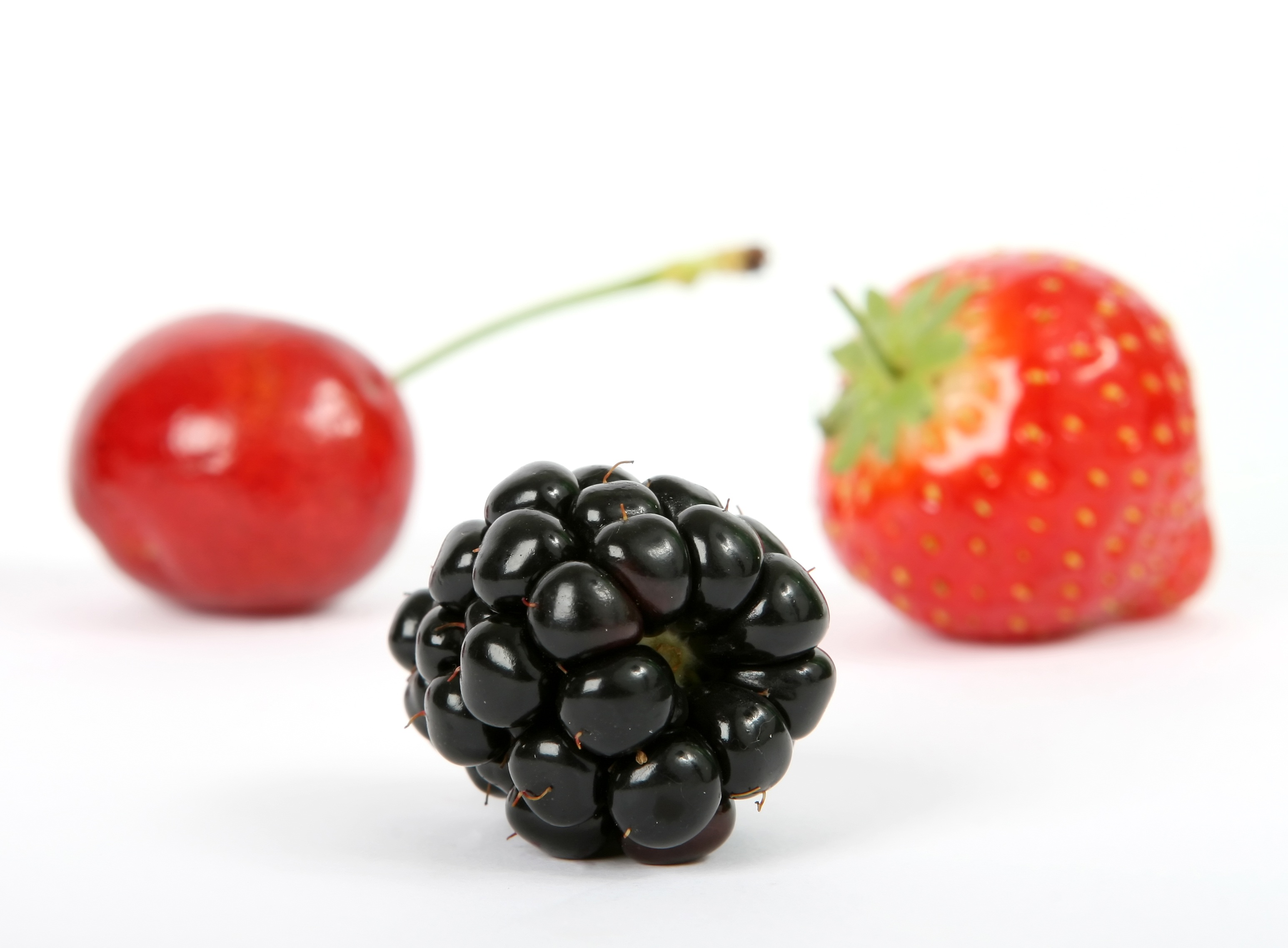 Free photo Delicious berries on a white background.