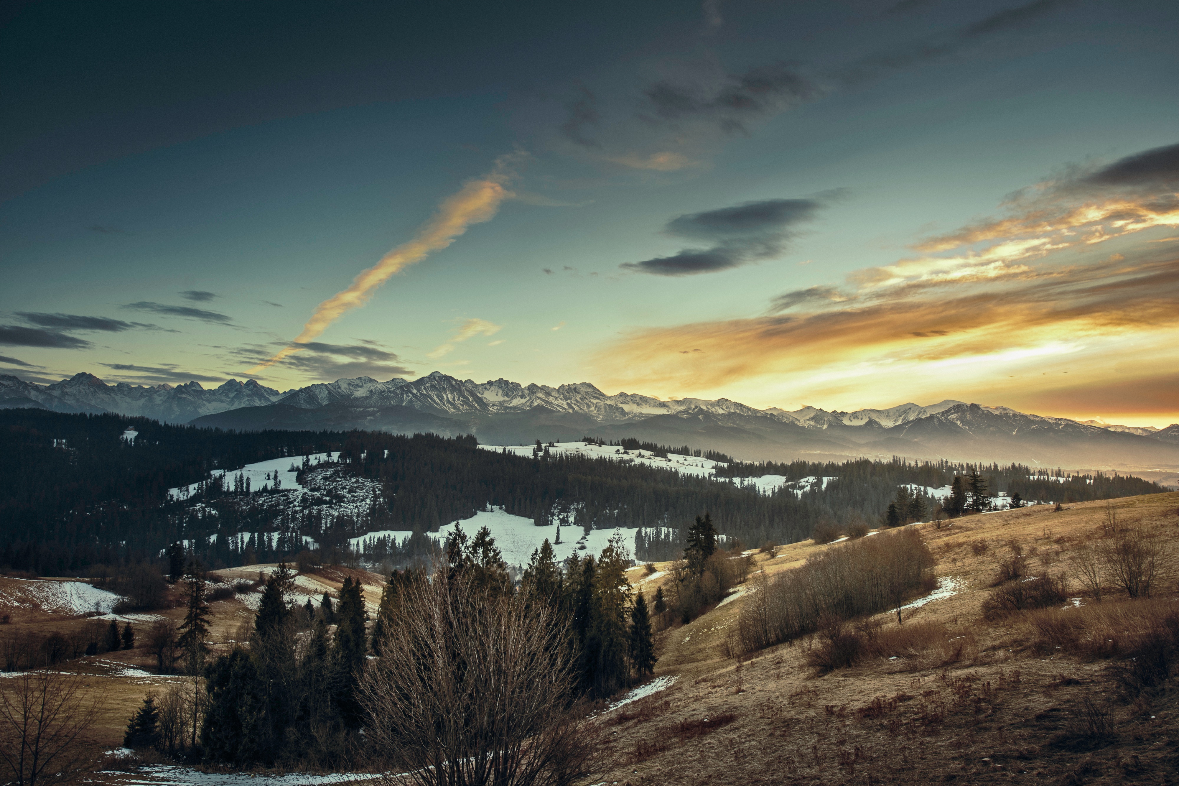 Free photo Autumn landscape with hills among the mountains