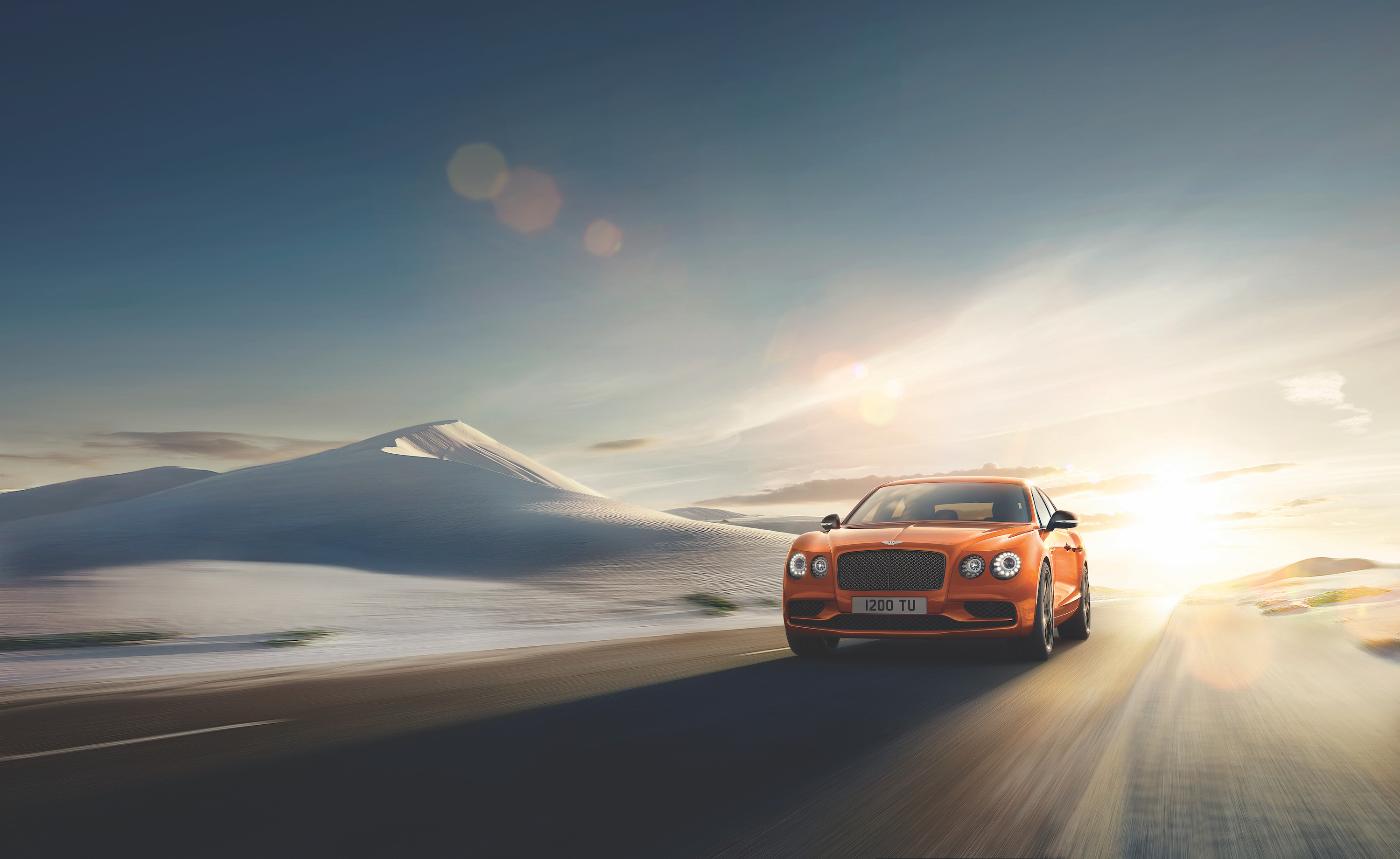 Free photo An orange Bentley.