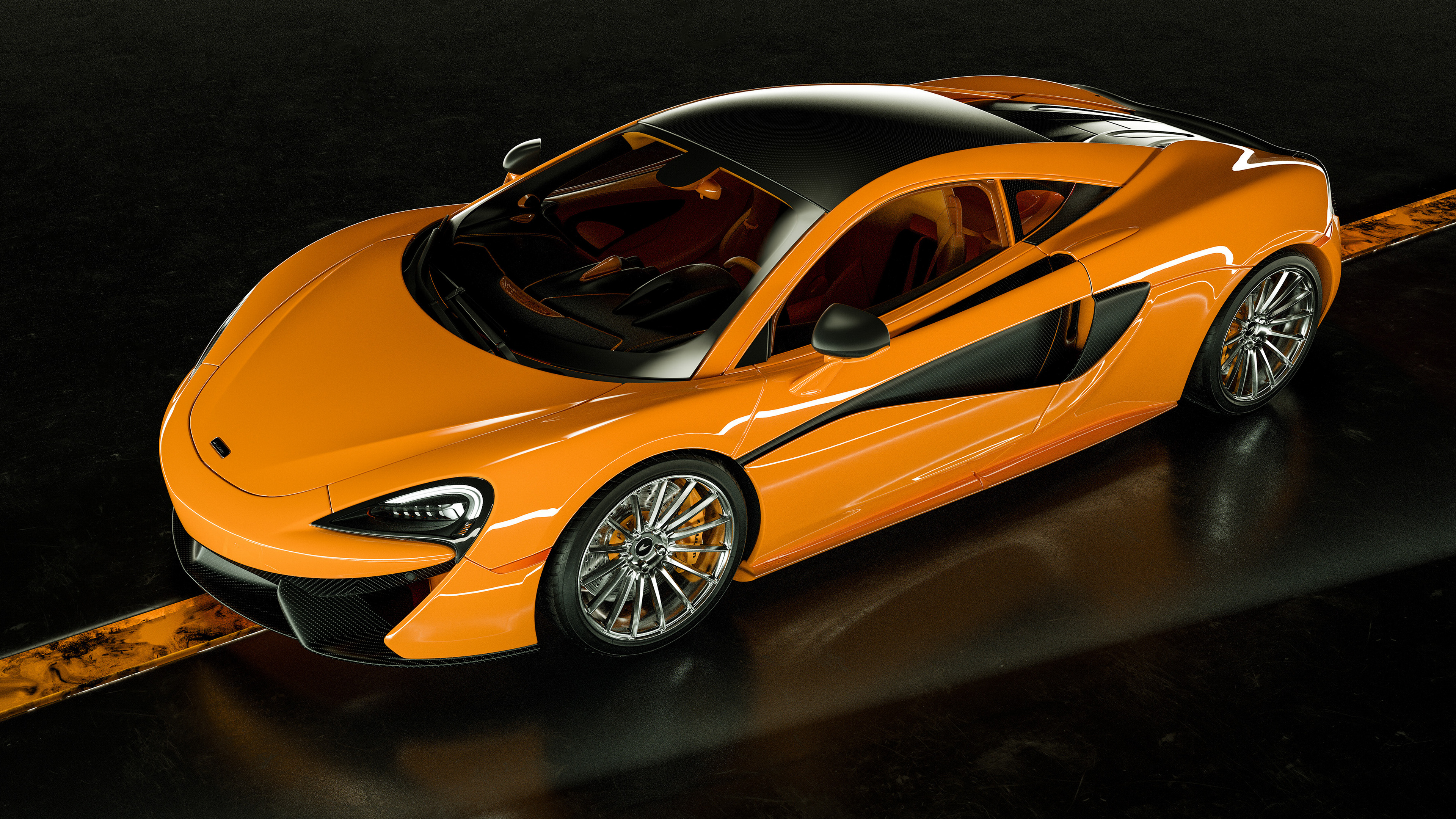 Free photo Orange McLaren 570S with chrome rims