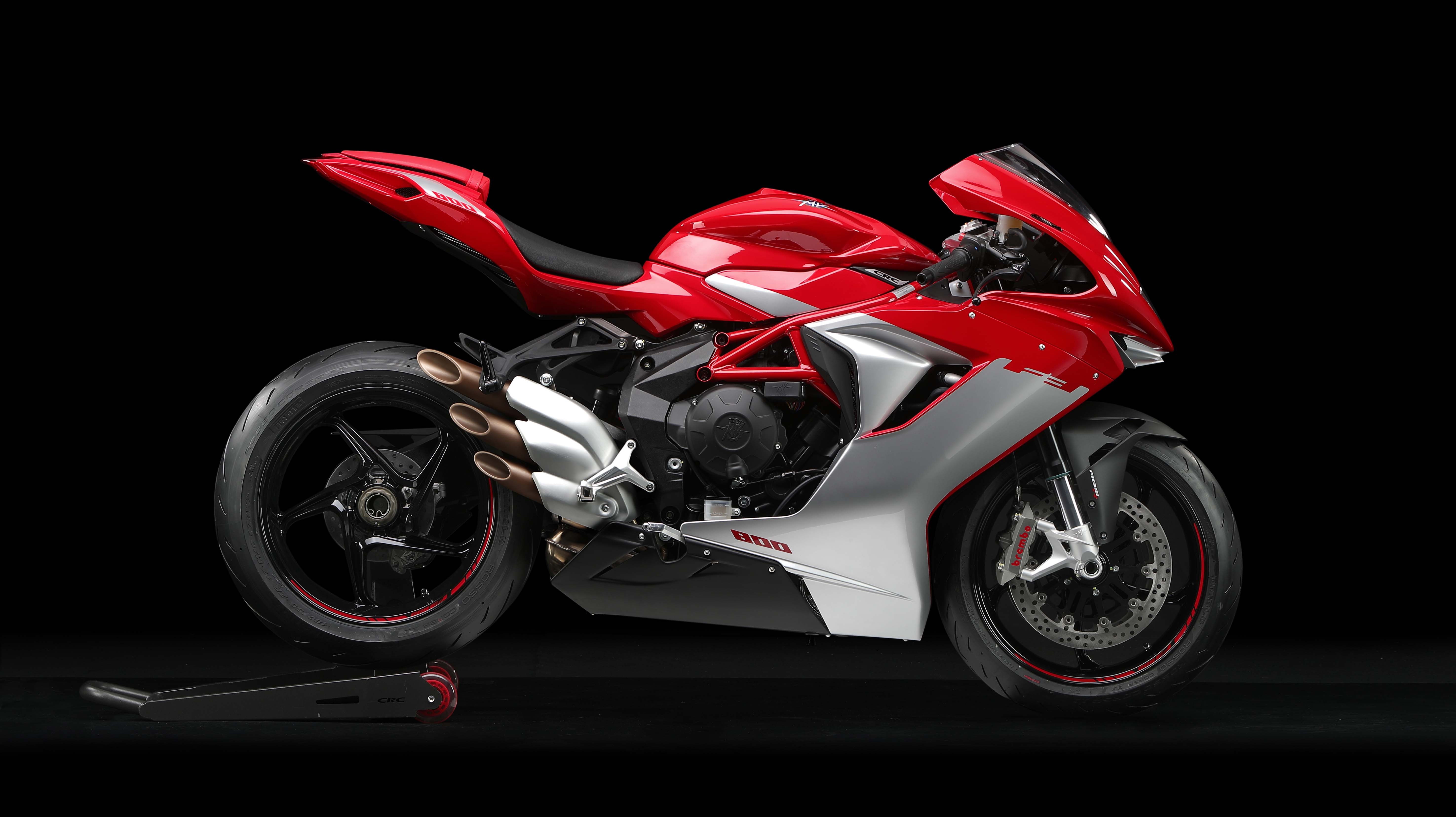 Free photo Motorcycle mv agusta f3 800 standing sideways on black background