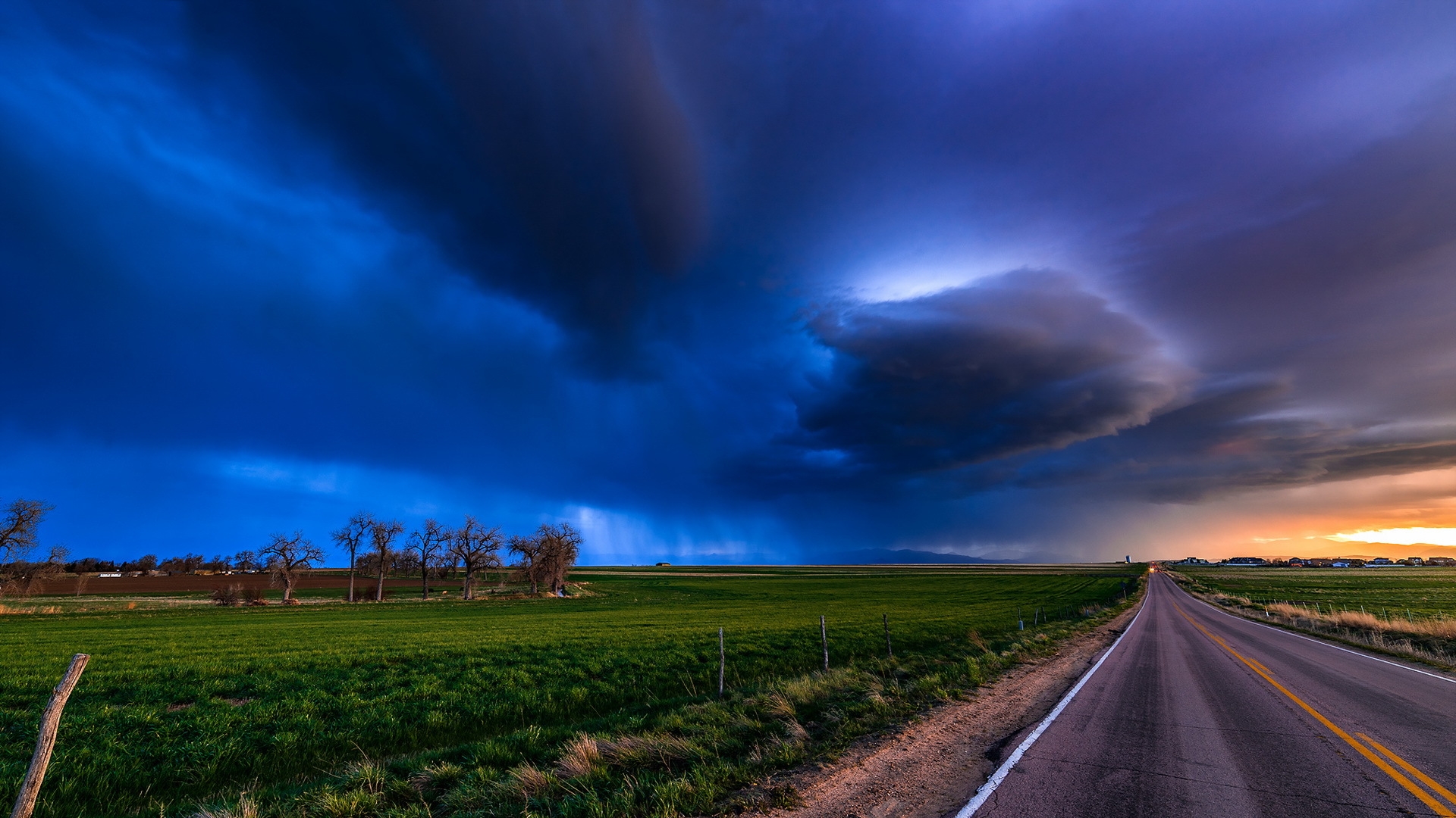 Free photo Rain clouds over the field