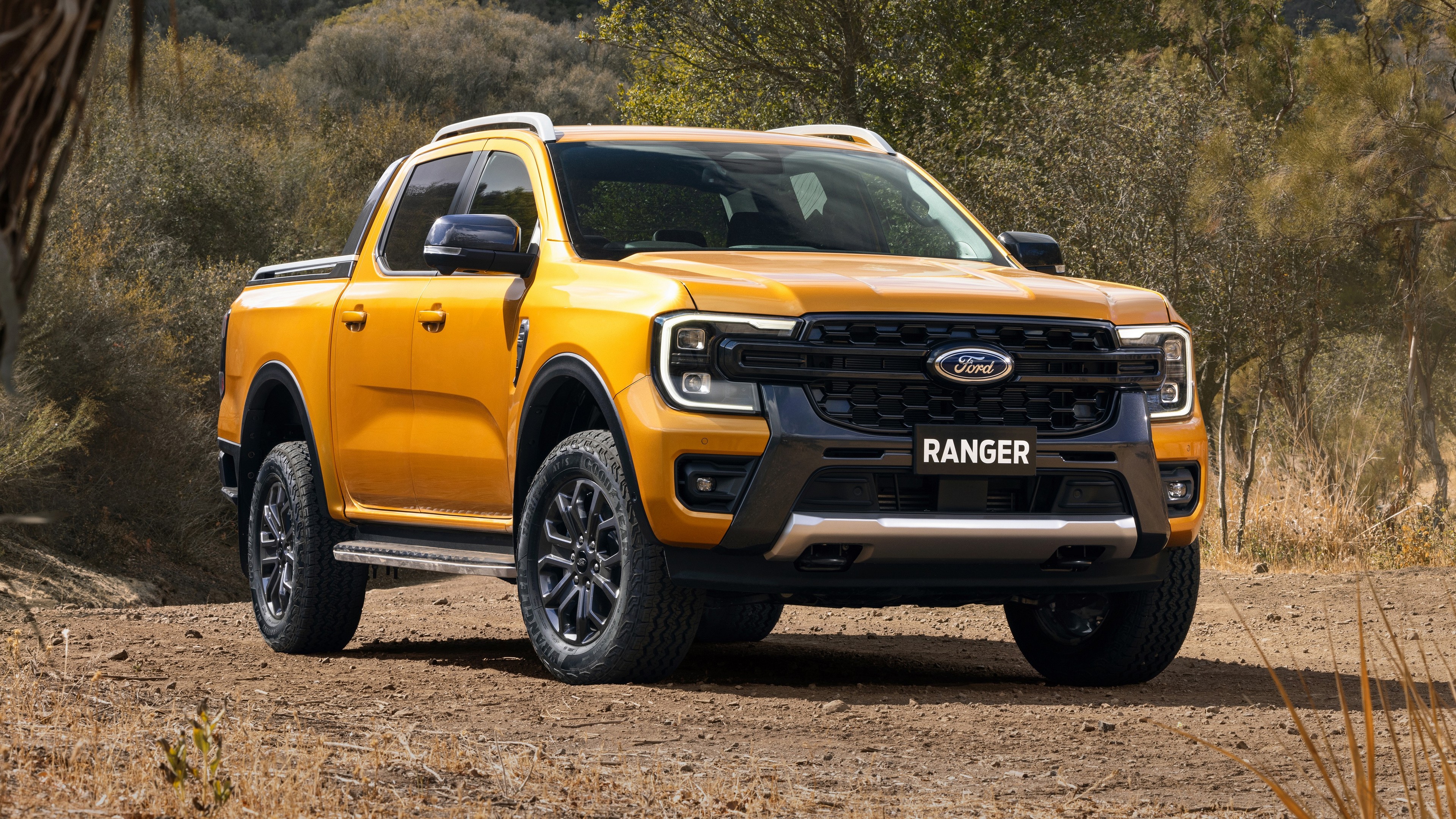 Free photo Yellow 2022 Ford Ranger Wildtrak pickup truck