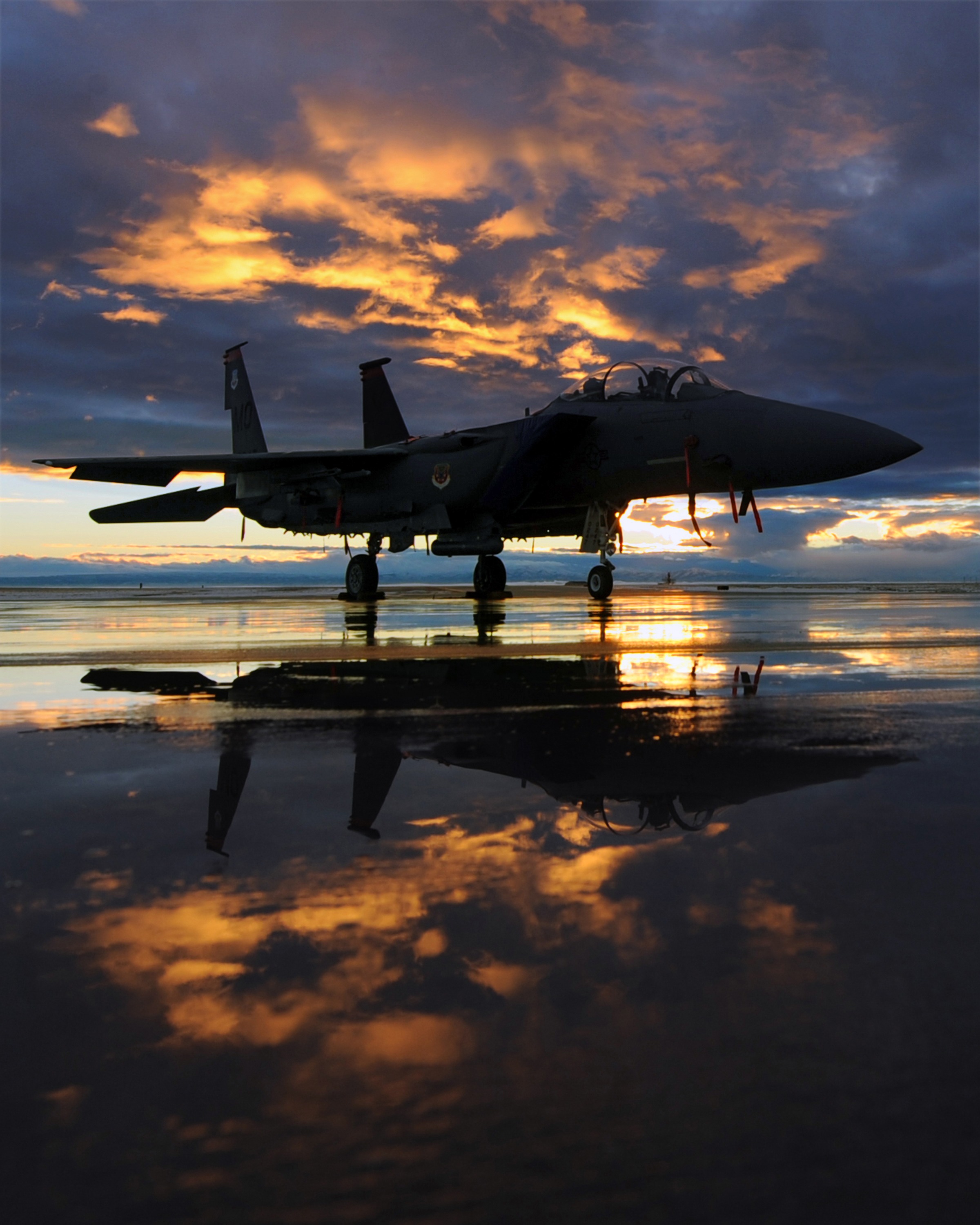 Free photo A military plane at the airport at sunset