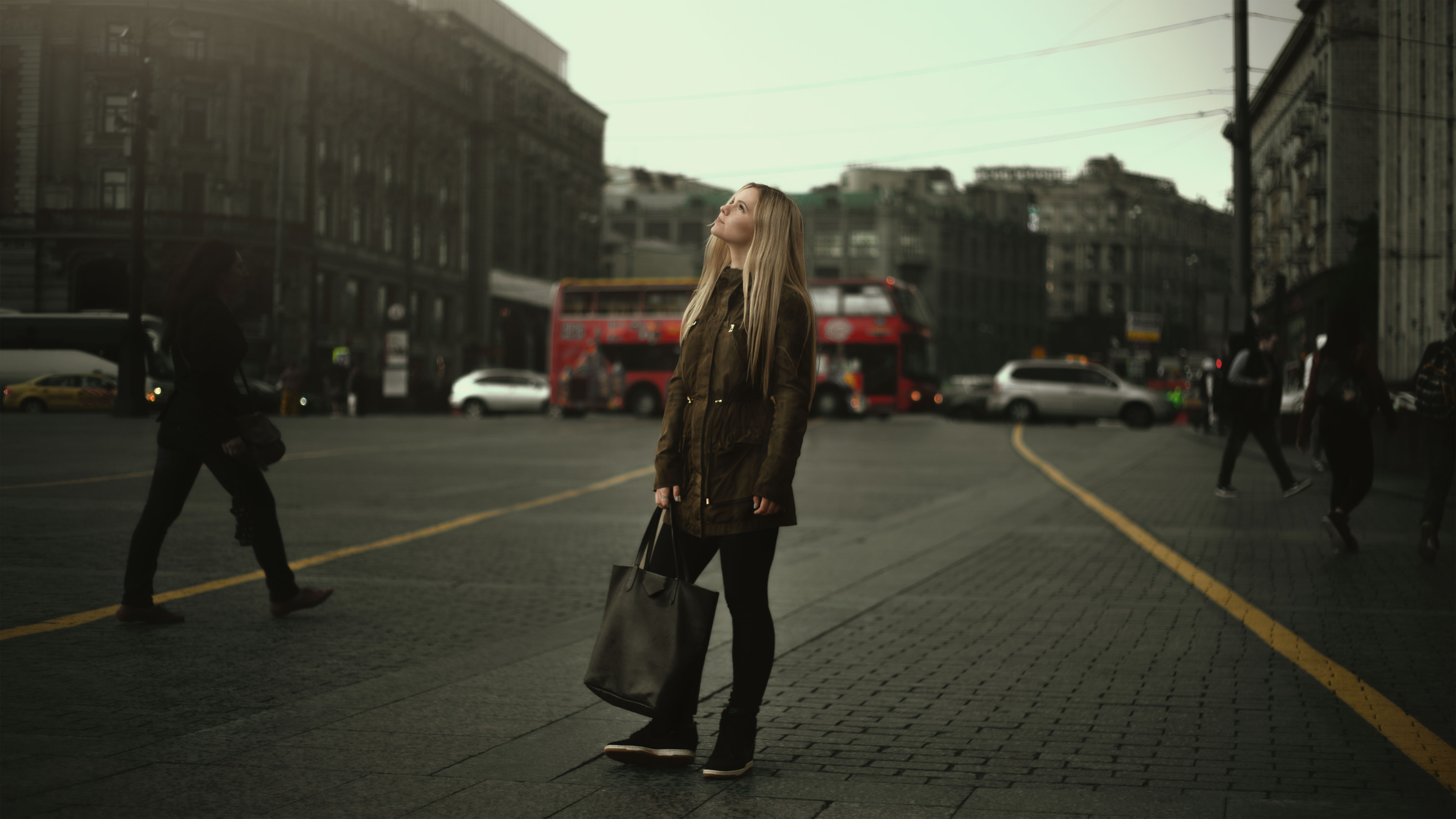 Free photo A girl standing in a square in England