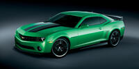 Green Chevrolet Camaro on a dark background