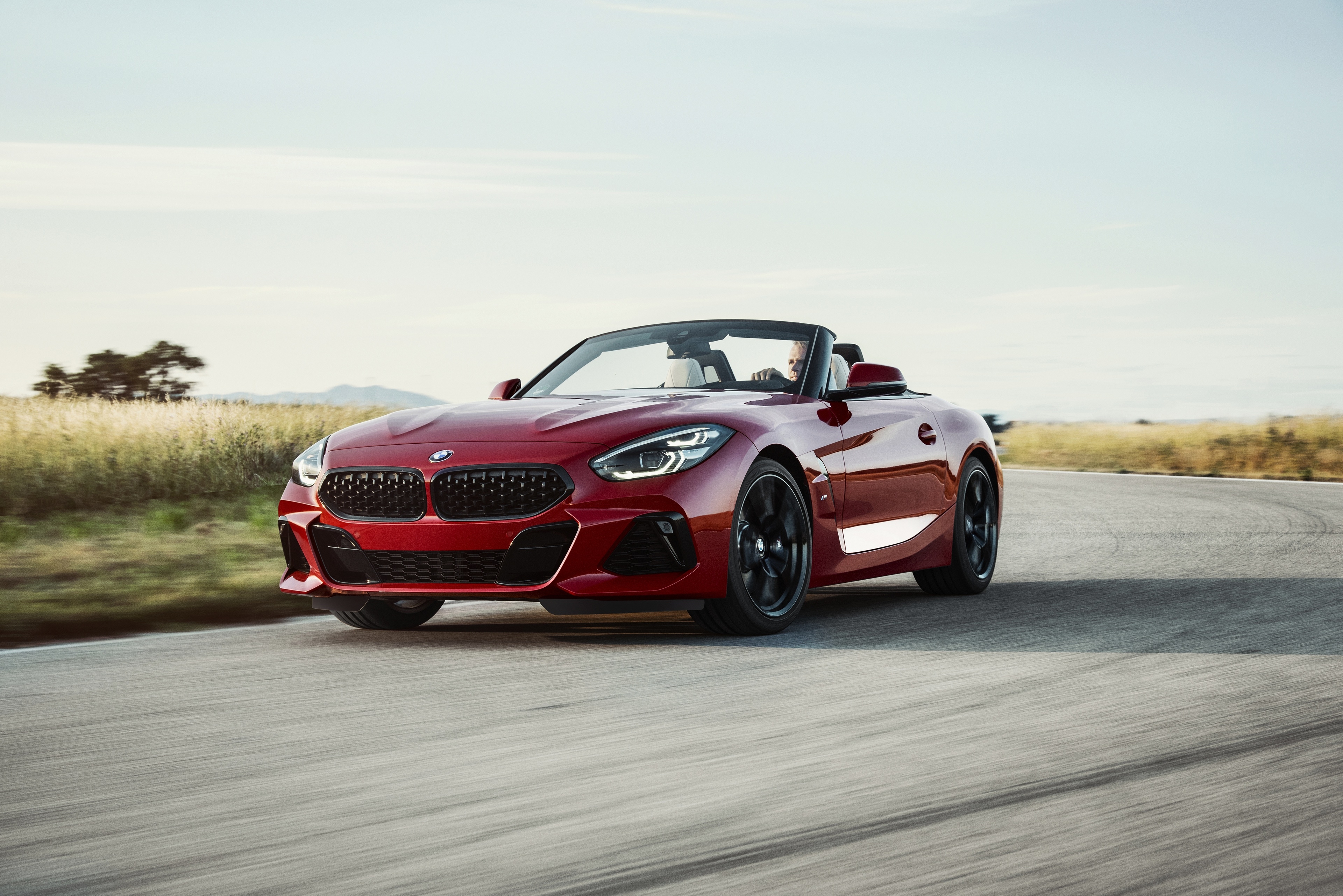 Free photo The red bmw z4 is speeding.