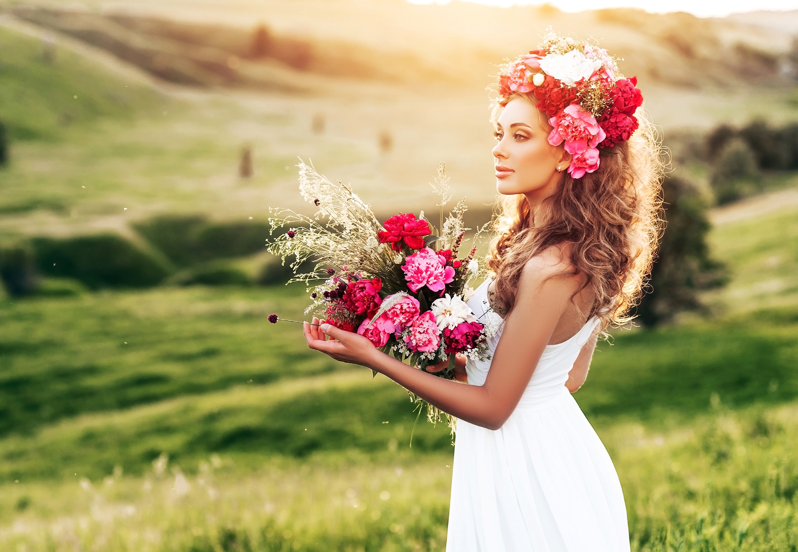 Free photo A beautiful bride with a bouquet