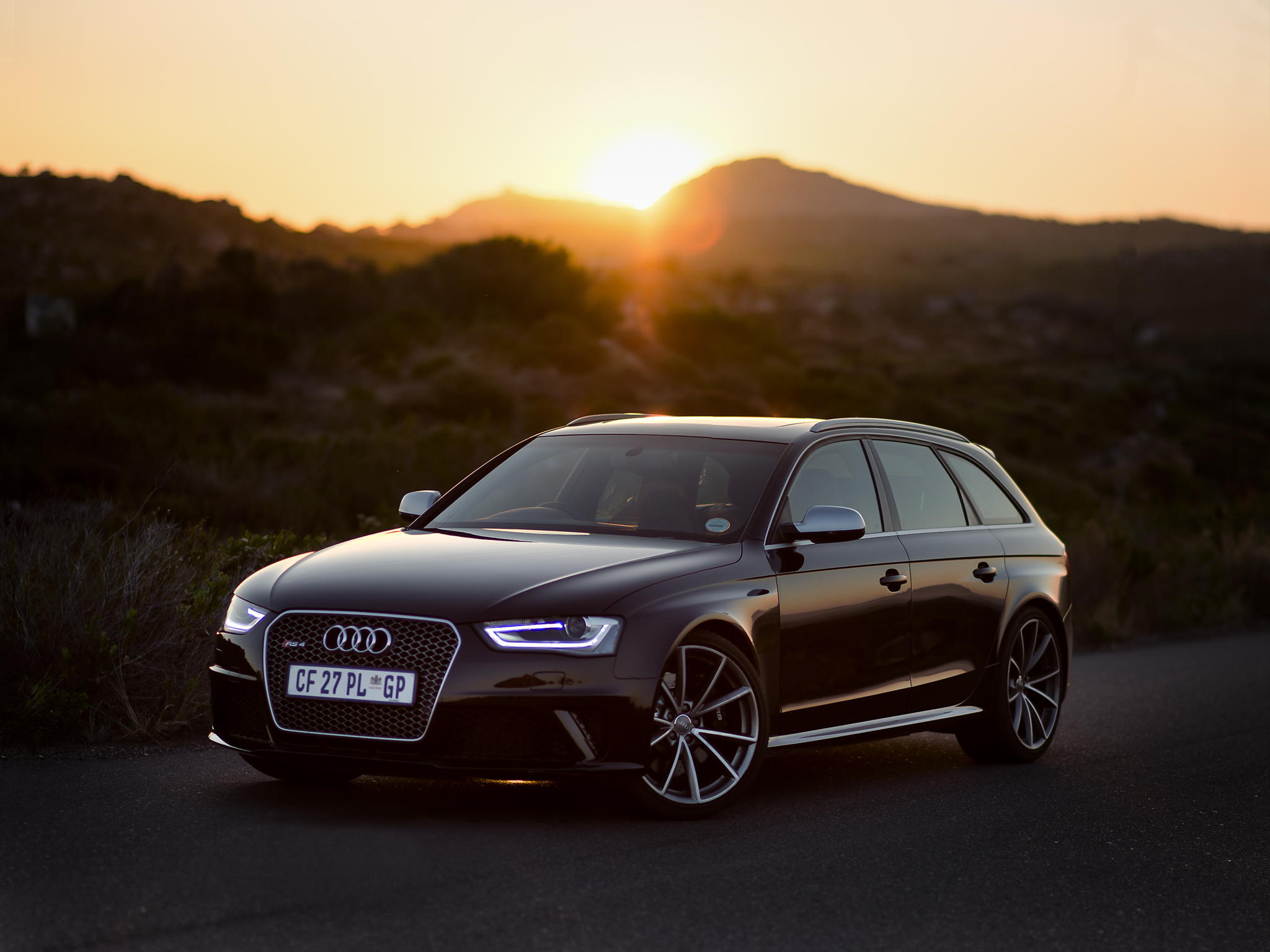 Free photo Black audi rs 6 at sunset.