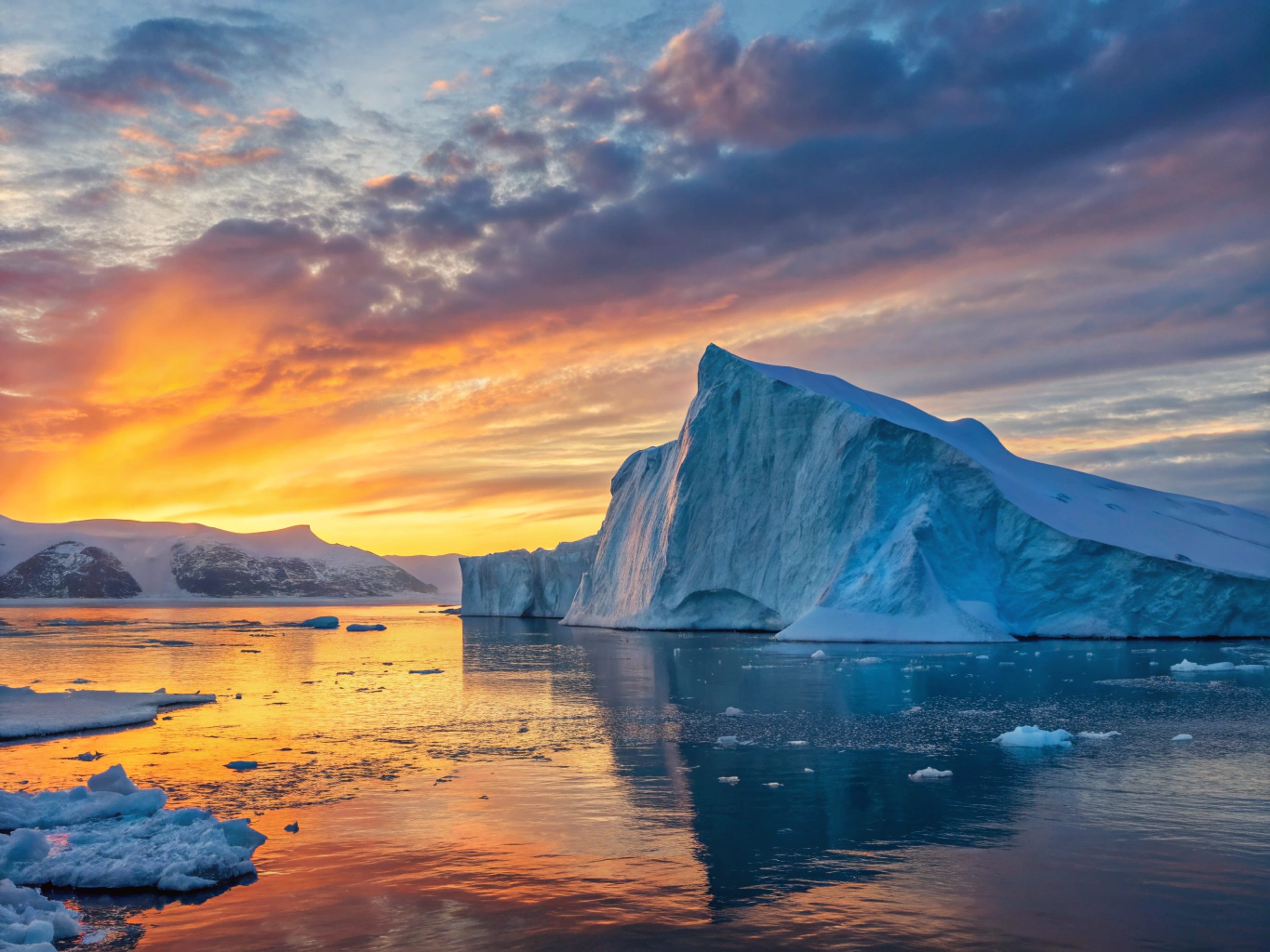 An iceberg at dawn in the winter sea
